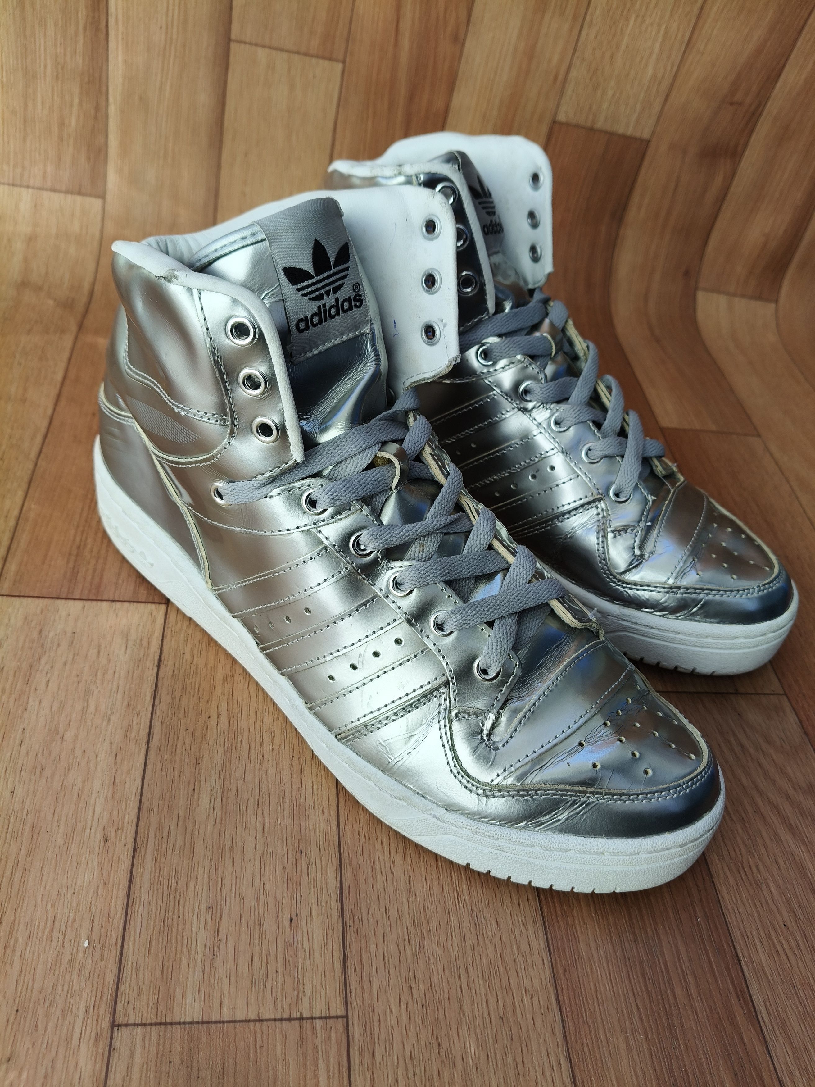 Jeremy Scott liquid silver sneakers