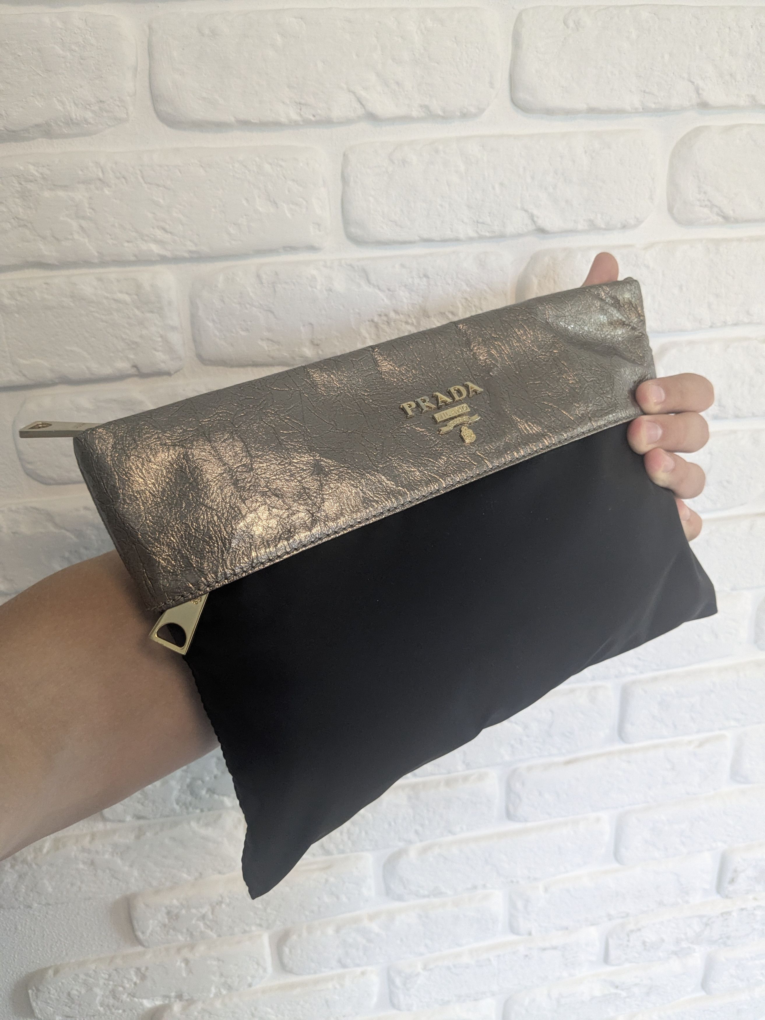 Prada Leather and neilon prada clutch bag black and Gold color Size ONE SIZE - 1 Thumbnail