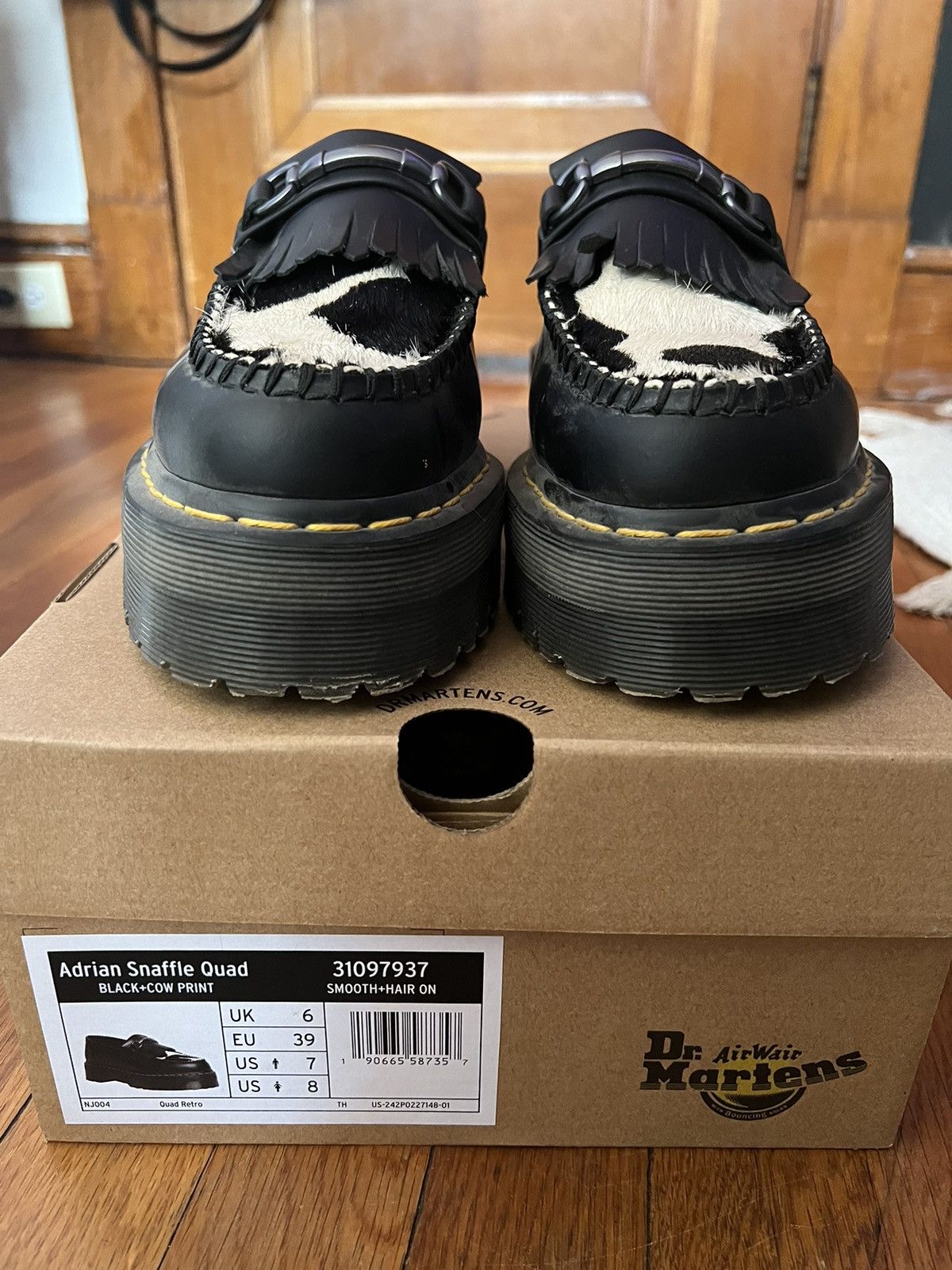 Dr. Martens Dr. Martens black and white cow print loafers