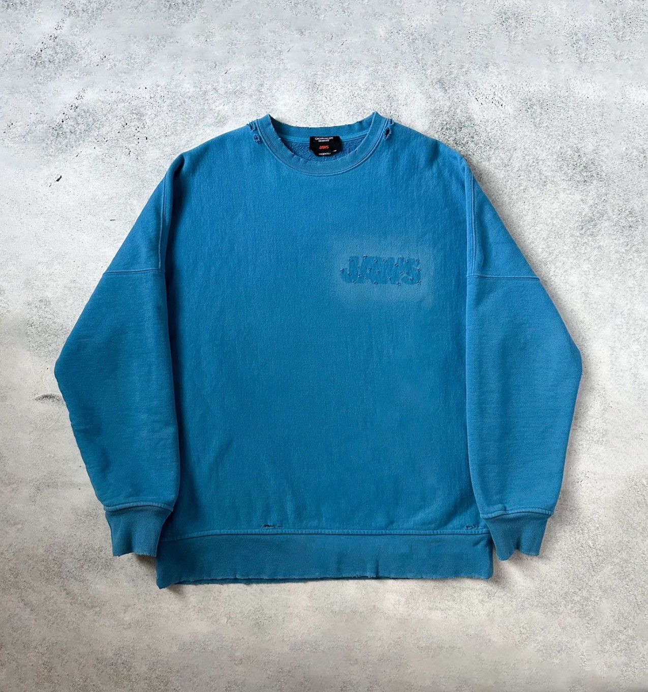 image of Calvin Klein 205W39Nyc x Raf Simons Jaws Distressed Crewneck Sweatshirt in Blue, Men's (Size XL)