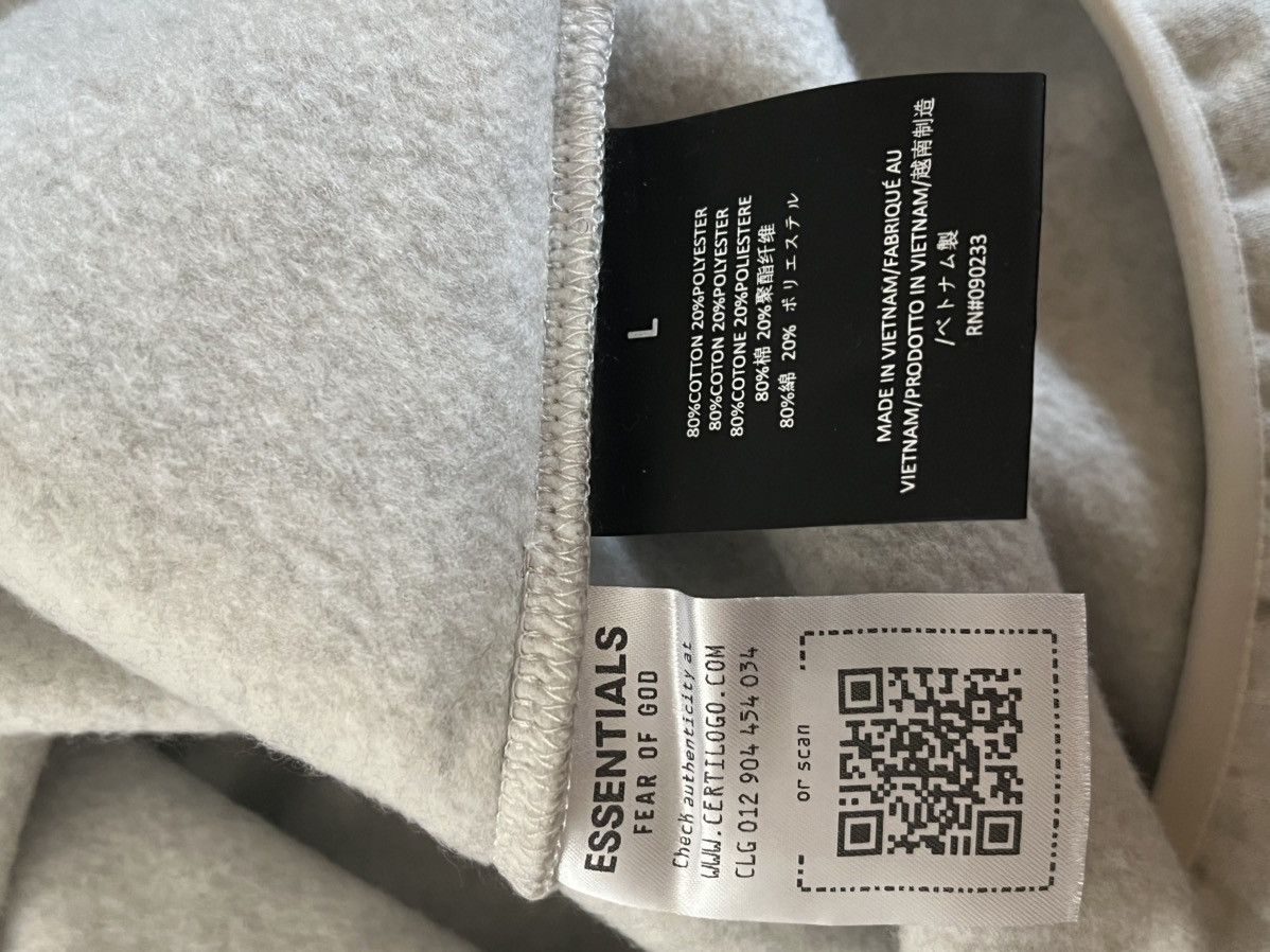 Essentials × NBA Fear of God Essentials NBA Hoodie Hawks light heather Size US L / EU 52-54 / 3 - 10 Thumbnail