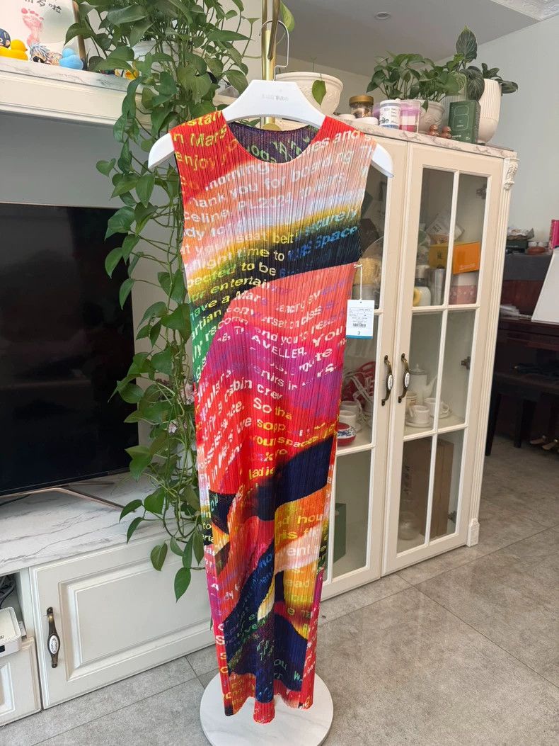 Issey Miyake Red pleated skirt for space travelers