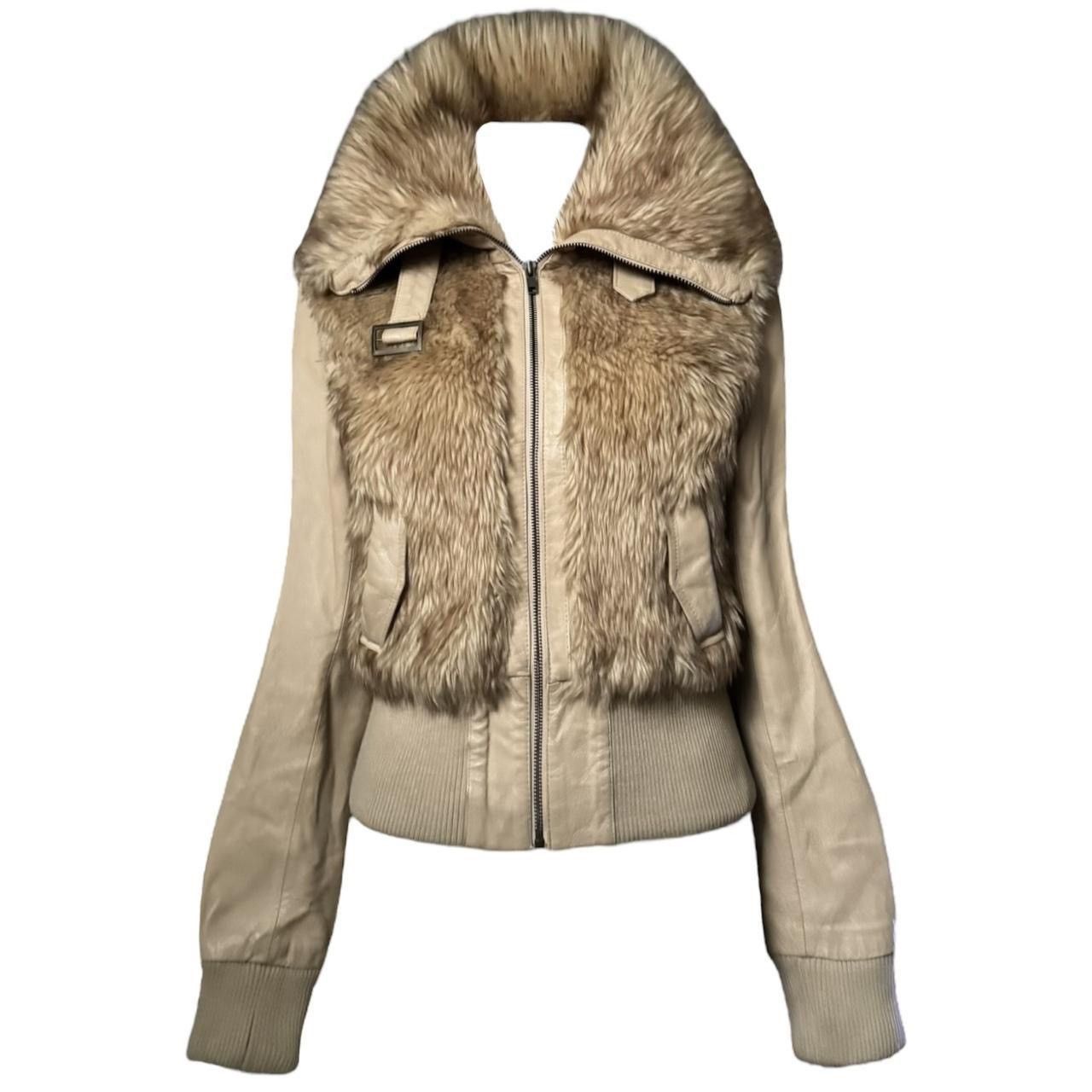 Genuine leather jacket with fur details and cinched inserts