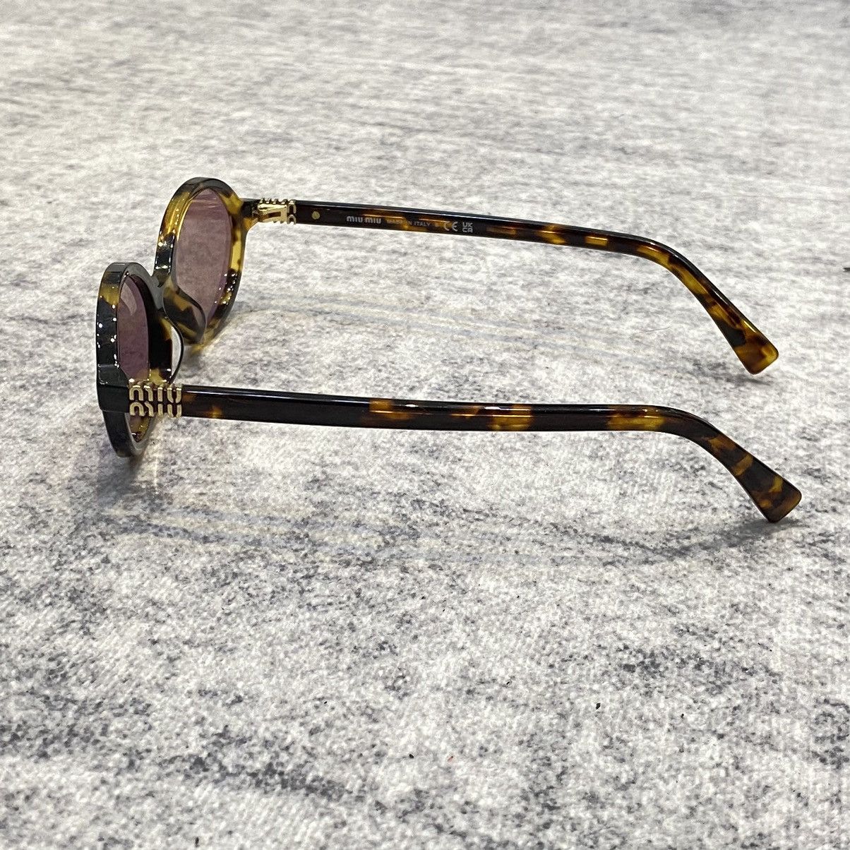 Miu Miu MIU MIU MU 04ZS VAU50D Eyewear HONEY Size ONE SIZE - 7 Thumbnail