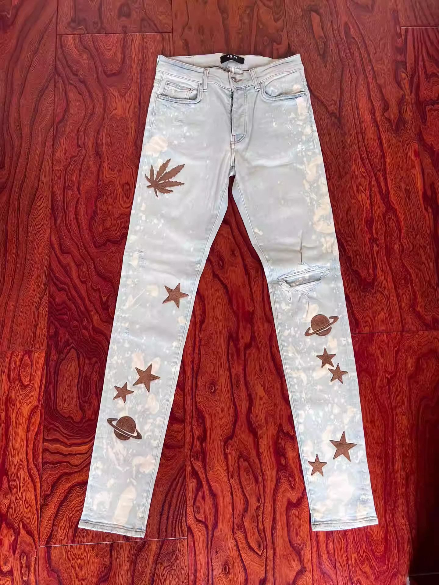 Amiri AMIRI ripped ink-splashed patch jeans-2506 Size US 31 - 1 Thumbnail