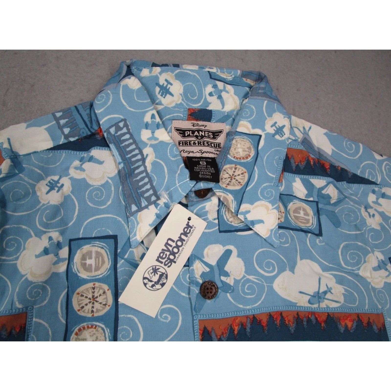 Reyn Spooner REYN SPOONER DISNEY Men Blue short sleeve button up Hawaiian shirt w/ AOP "Planes Fire & Rescue" movie themed design - 100% rayon - made in USA Size US S / EU 44-46 / 1 - 3 Thumbnail