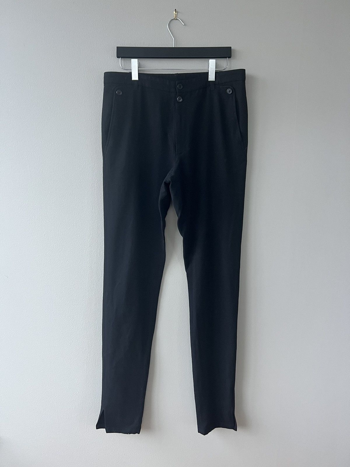 image of Ann Demeulemeester Slit Hem Wool Trousers in Black, Men's (Size 34)