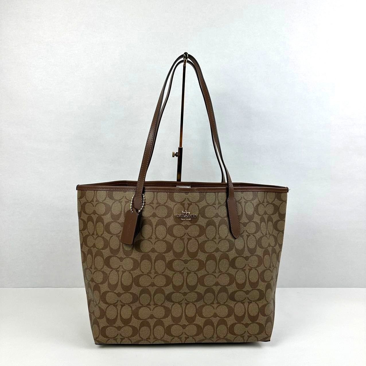 Coach 5696 City Tote Bag In Signature Canvas In Khaki Saddle in Brown, Women's