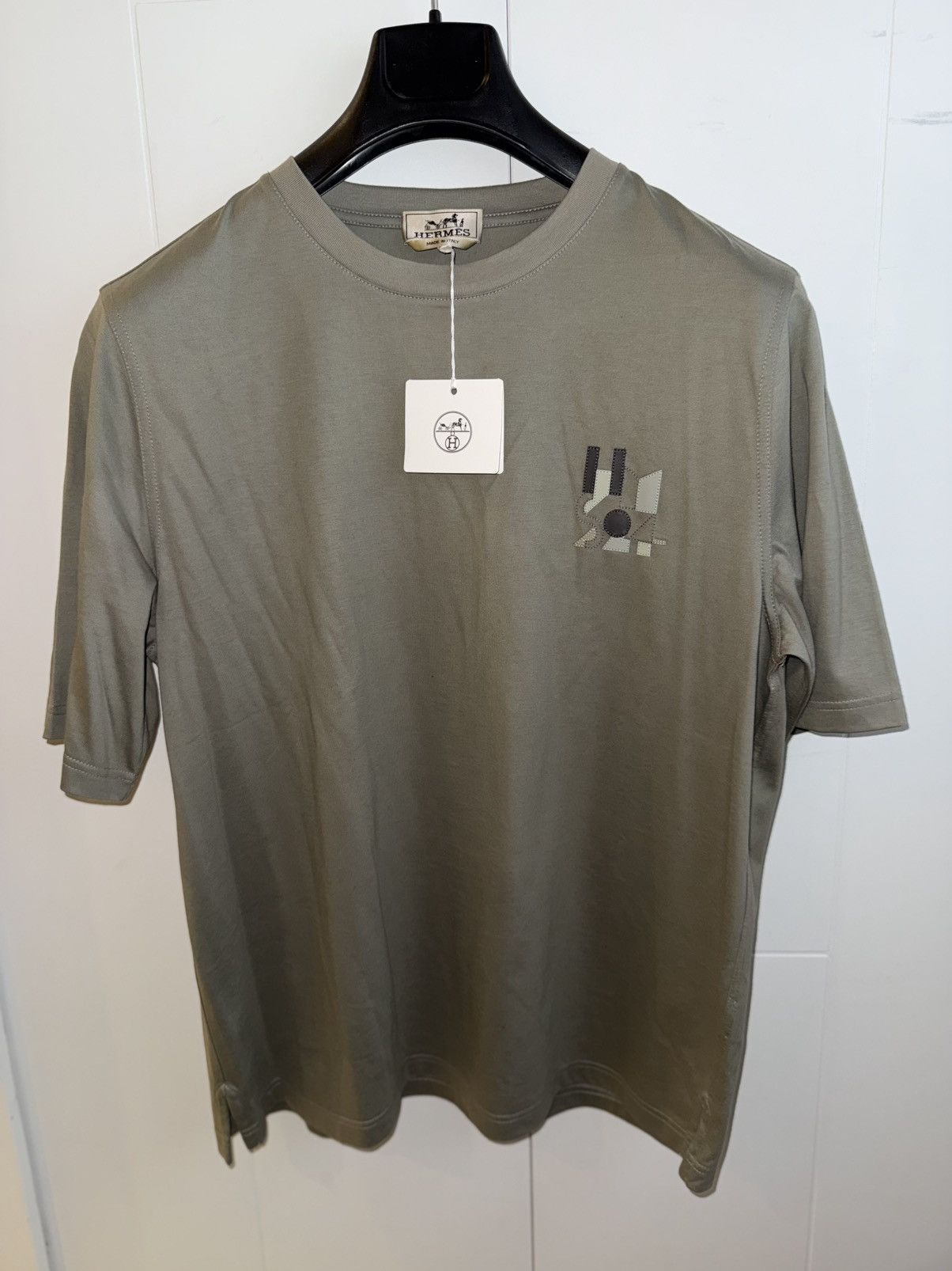 Hermes Hermes H puzzle logo t shirt w leather detail | Grailed