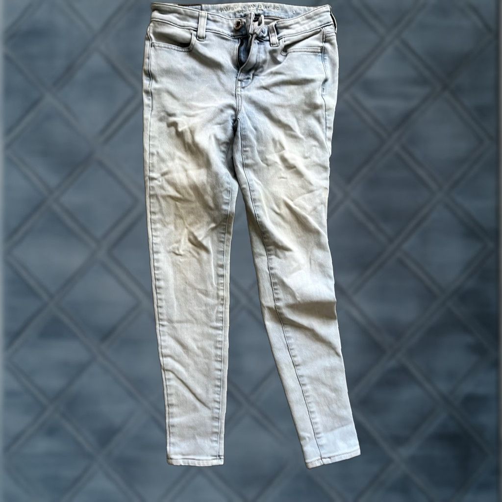 American Eagle Outfitters American Eagle Blue Super Stretch X4 Hi-Rise Jegging Pants 0 Wash Distress Women Jeans Size 25" / US 0 / IT 36 - 1 Thumbnail