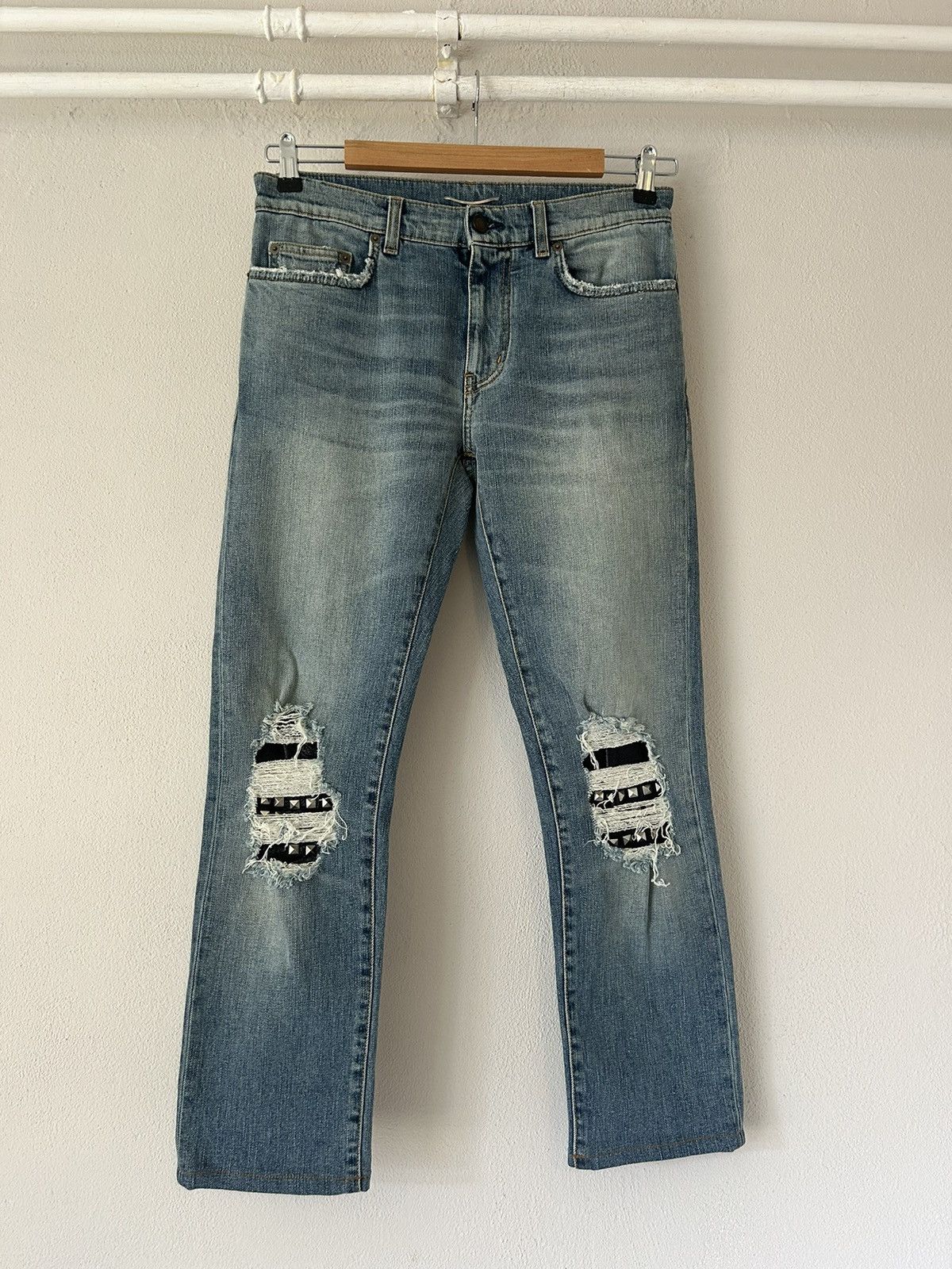 SAINT LAURENT knee crash studs pants
