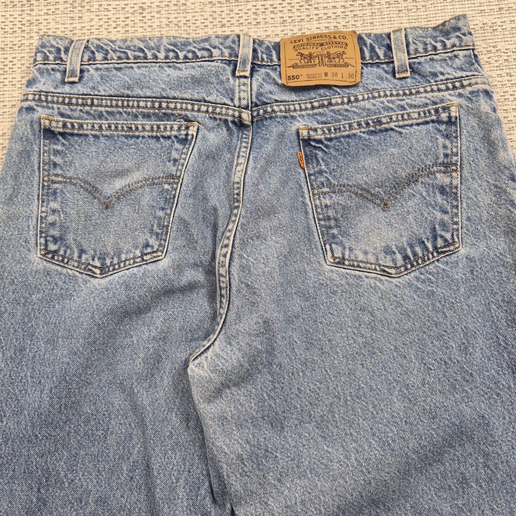 Levi's VINTAGE Levi's 550 Jeans Mens 38x30 Relaxed Tapered Light Wash Denim 90s USA 5-Pocket Mens Regular Blue Jeans Size US 38 / EU 54 - 3 Thumbnail