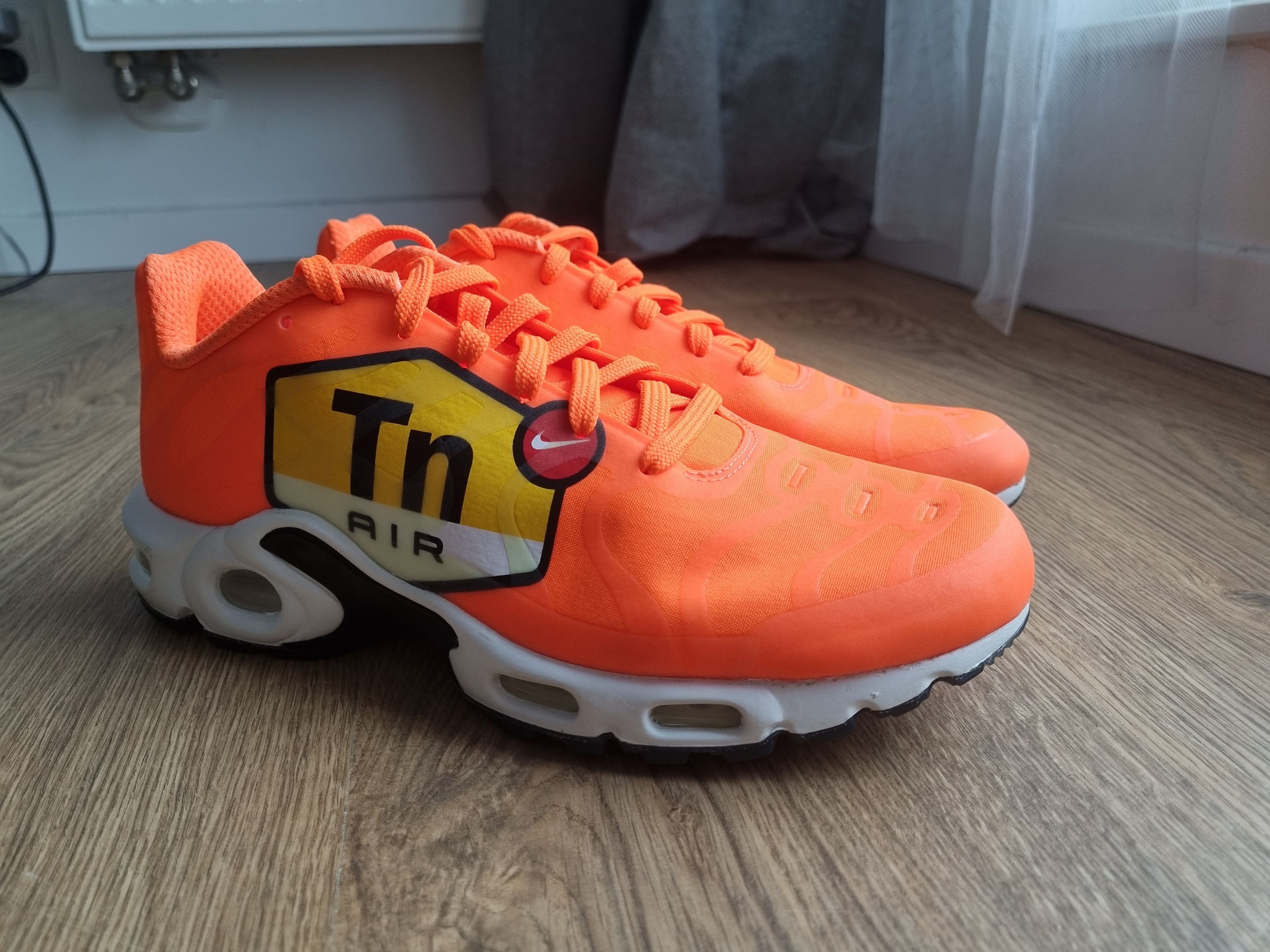 image of Nike Air Max Plus Big Logo Shoes in Orange White, Men's (Size 8)