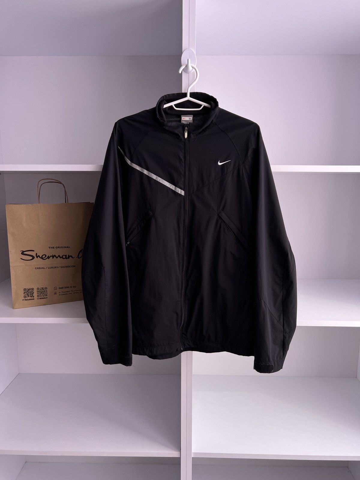Vintage Nike Light 90s style windbreaker jacket