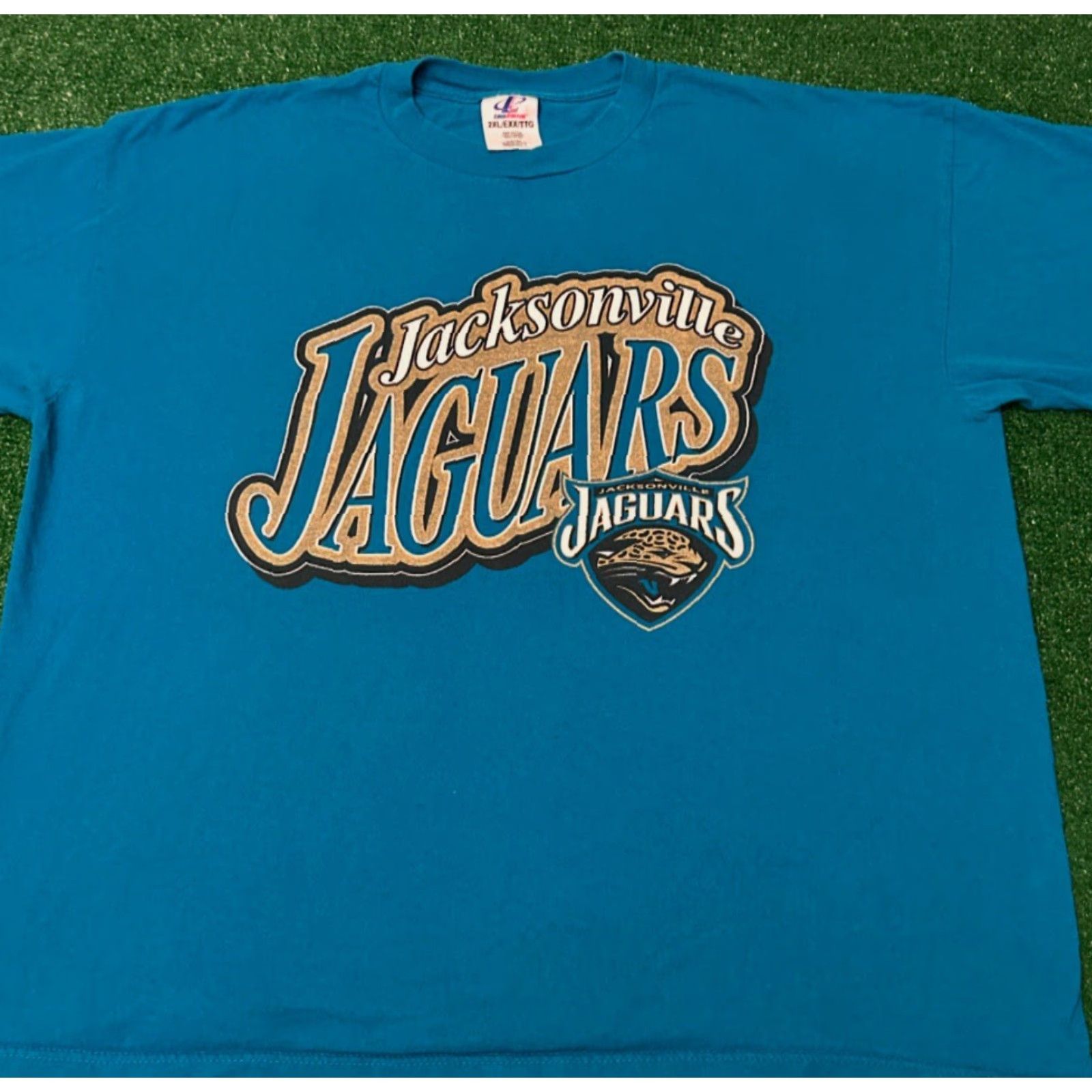 Logo Athletic VINTAGE Jacksonville Jaguars Classic Logo Spell Out VTG Shirt Mens XXL Blue 90s Sports Hip Hop T-Shirt Logo Athletic Short Sleeve Size US XXL / EU 58 / 5 - 3 Thumbnail