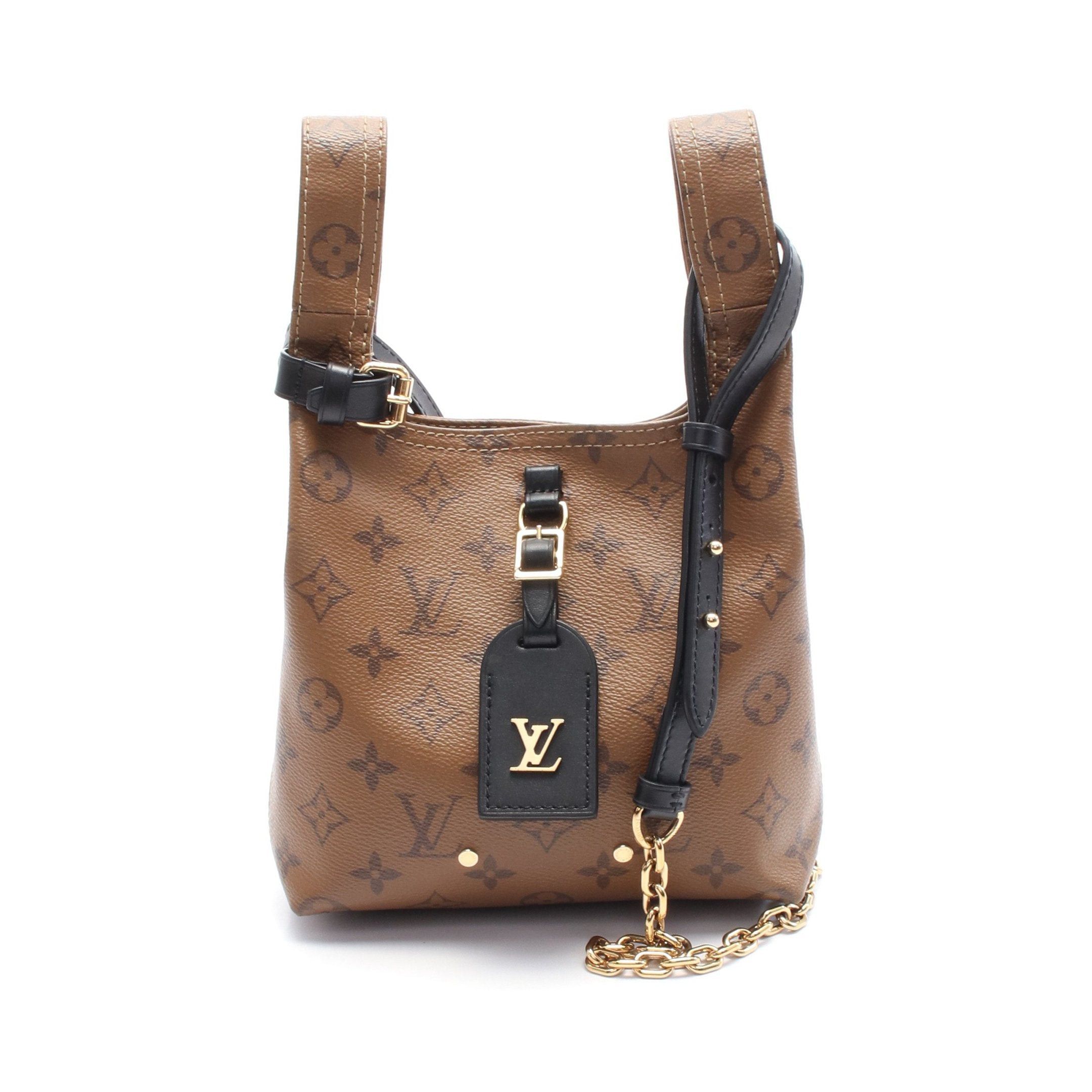 Louis Vuitton Louis Vuitton Atlantis Bb Monogram Reverse Handbag Leather Brown Size ONE SIZE - 1 Thumbnail