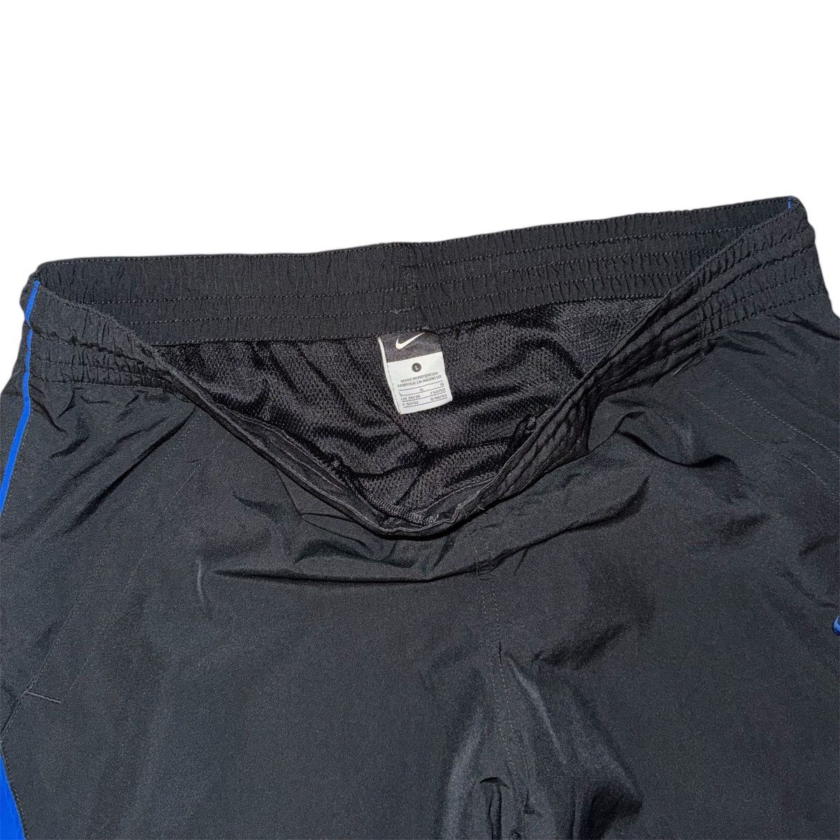 Nike BAGGY Y2K NIKE ATHLETIC BLACK/BLUE NYLON TRACK PANTS Size US 34 / EU 50 - 5 Thumbnail