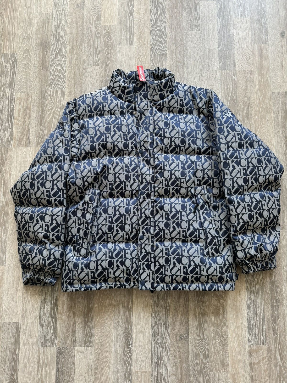 Supreme FW17 Supreme Fuck Jacquard Puffy Jacket Blue | Grailed