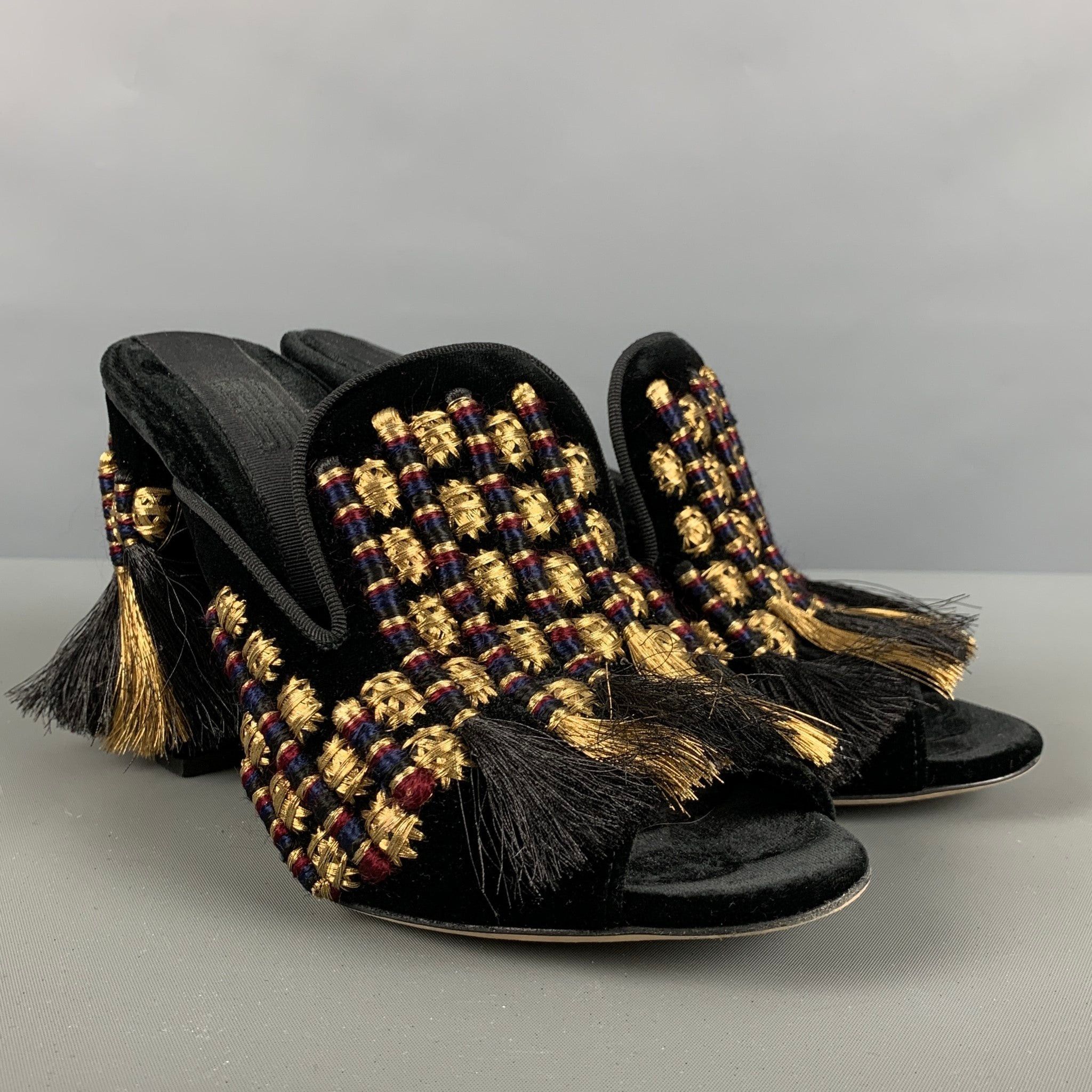 MULES SLIPPERS BLACK COWHIDE WITH GOLD COIN main image 0
