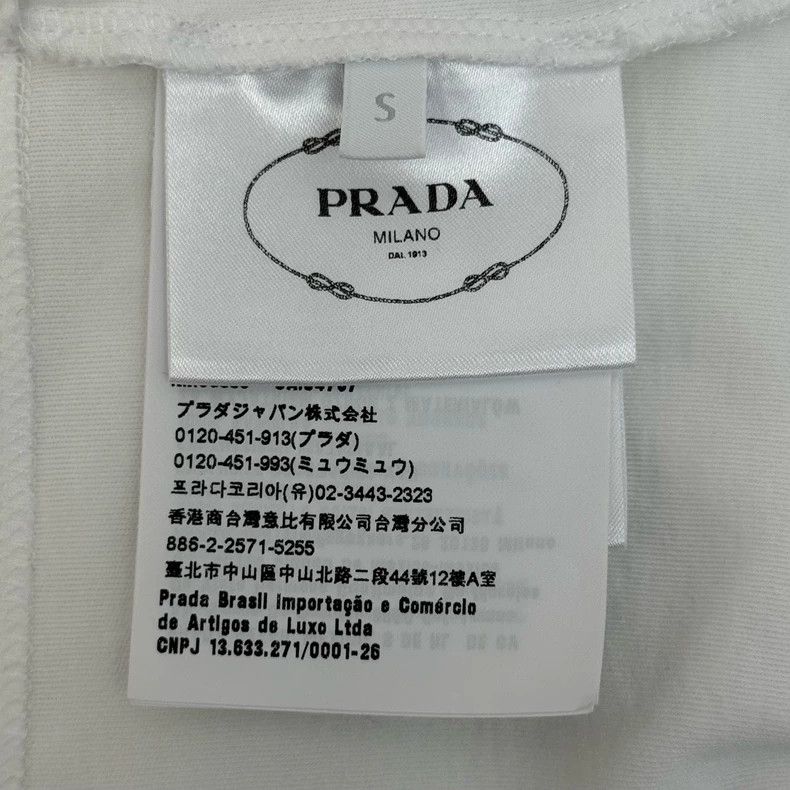 Prada Prada White heavy industry bead logo triangle label short-s Size US S / EU 44-46 / 1 - 7 Thumbnail