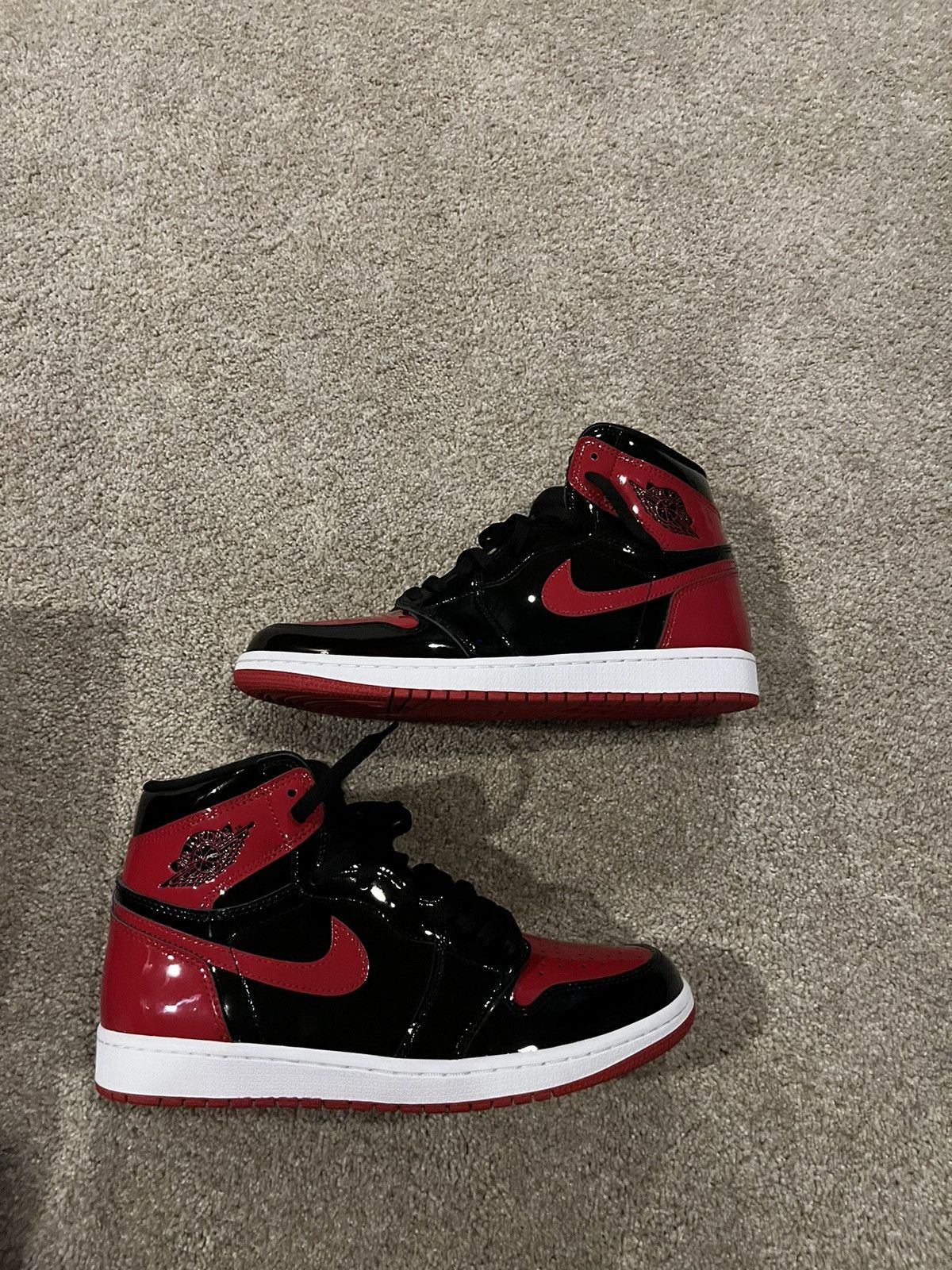 image of Jordan Brand 1 Patent Bred Leather Shoes in Black, Men's (Size 10)