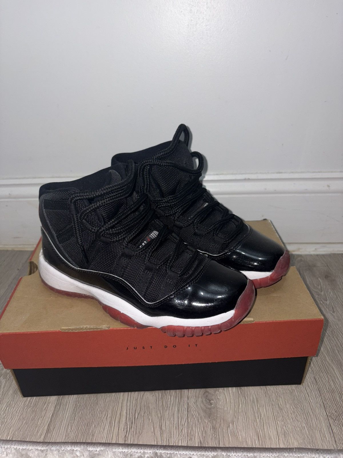 Jordan Brand Jordan Bred 11s Size US 6.5 / IT 36.5 - 1 Thumbnail