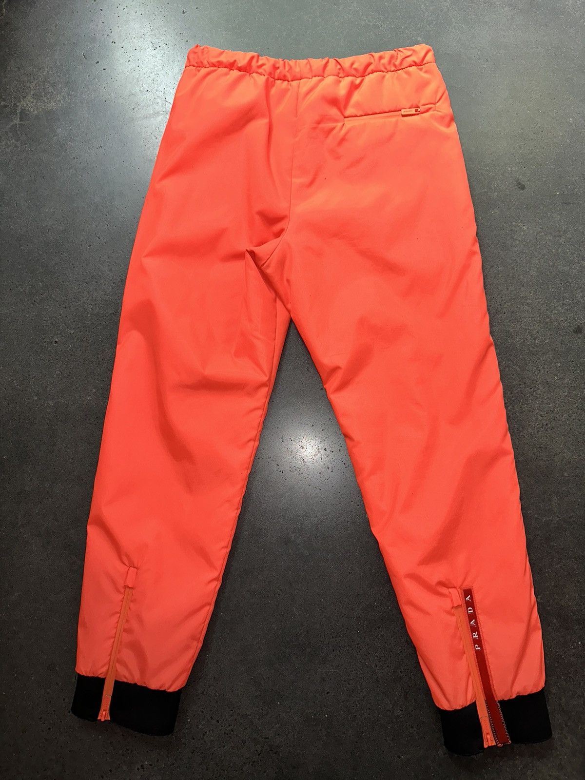 image of Prada Padded Sweat Pants Luna Rossa in Orange, Men's (Size 30)