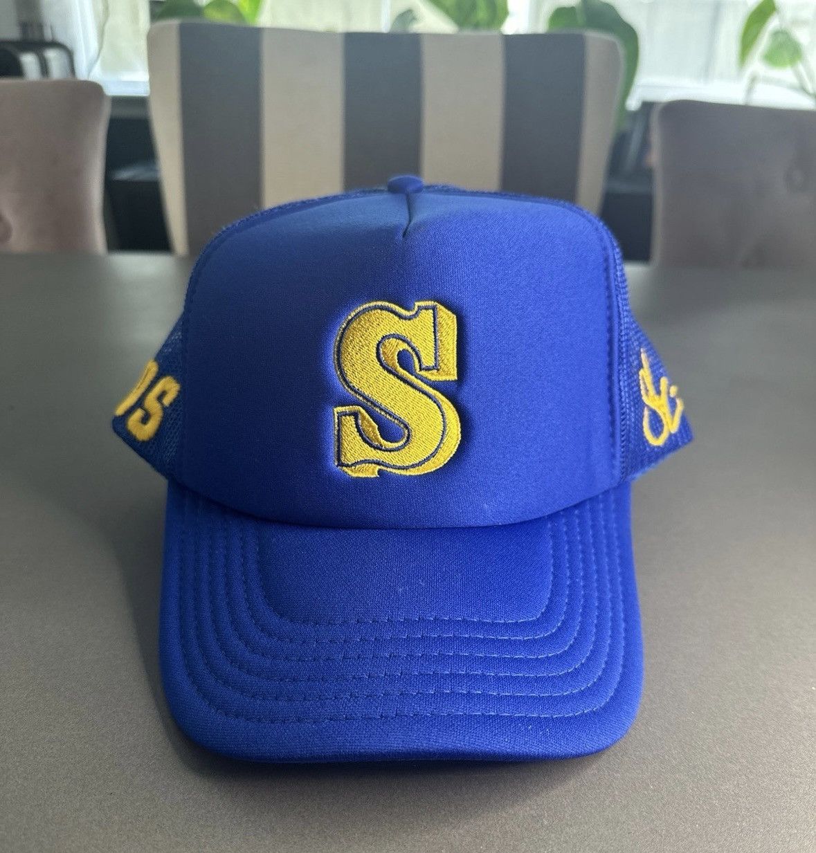 Blue SZA trucker hat from SOS tour