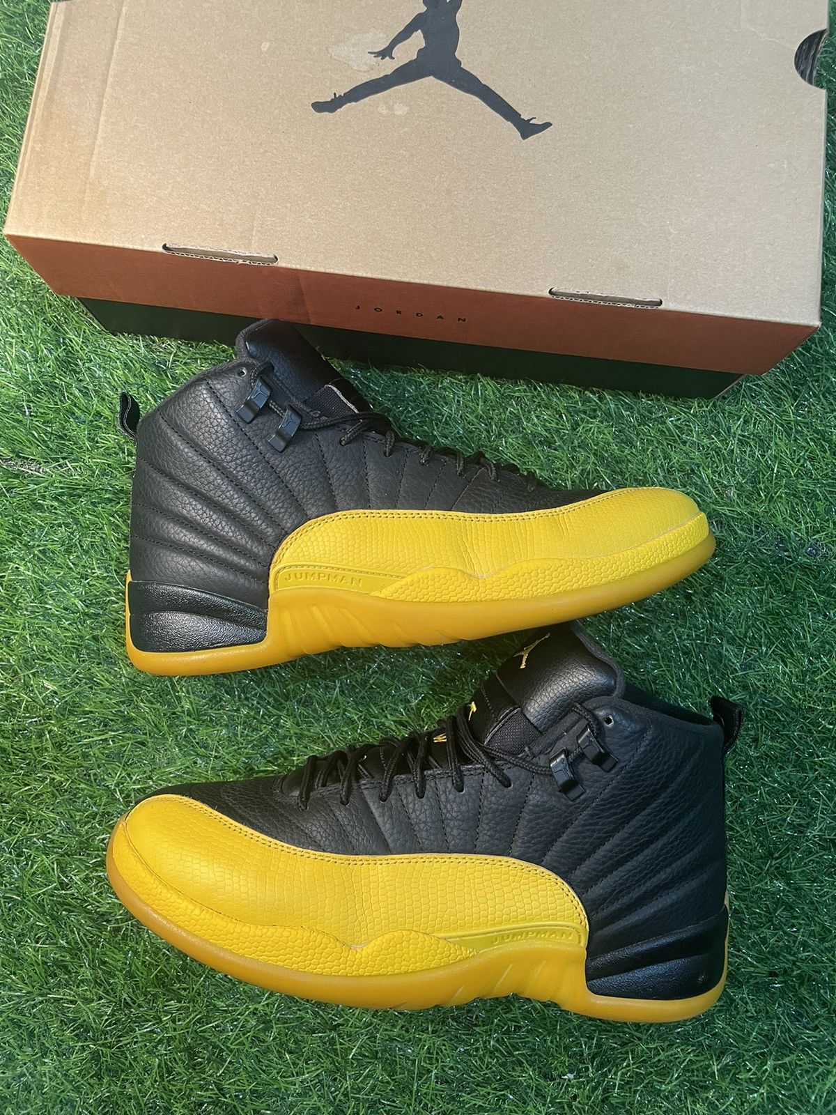 image of Jordan Brand 12 University Gold Shoes in Black/Yellow, Men's (Size 10)