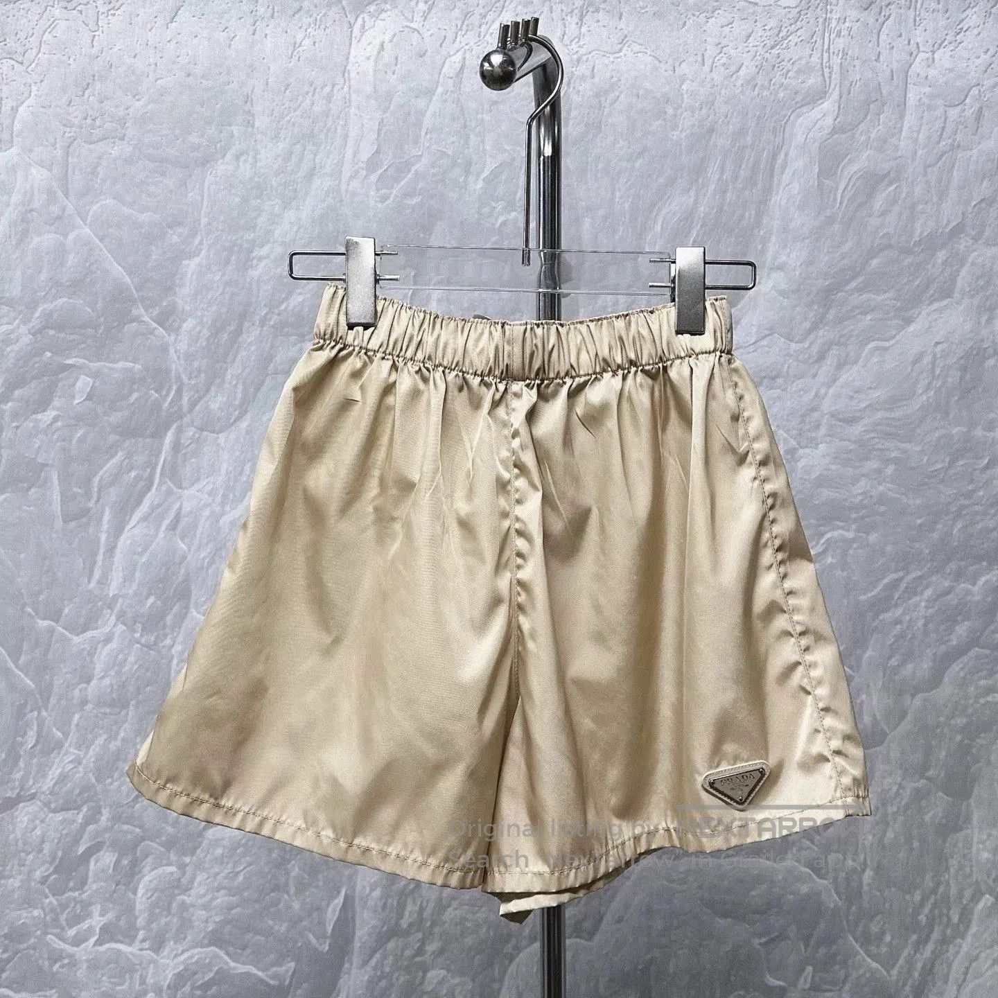 Prada prada metallic triangle logo elastic shorts. Size 35" - 1 Thumbnail
