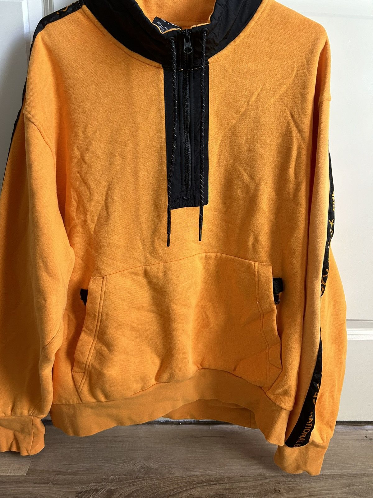 NIKE NBA TEAM 31 COURTSIDE FLEECE HOODIE KUMQUAT