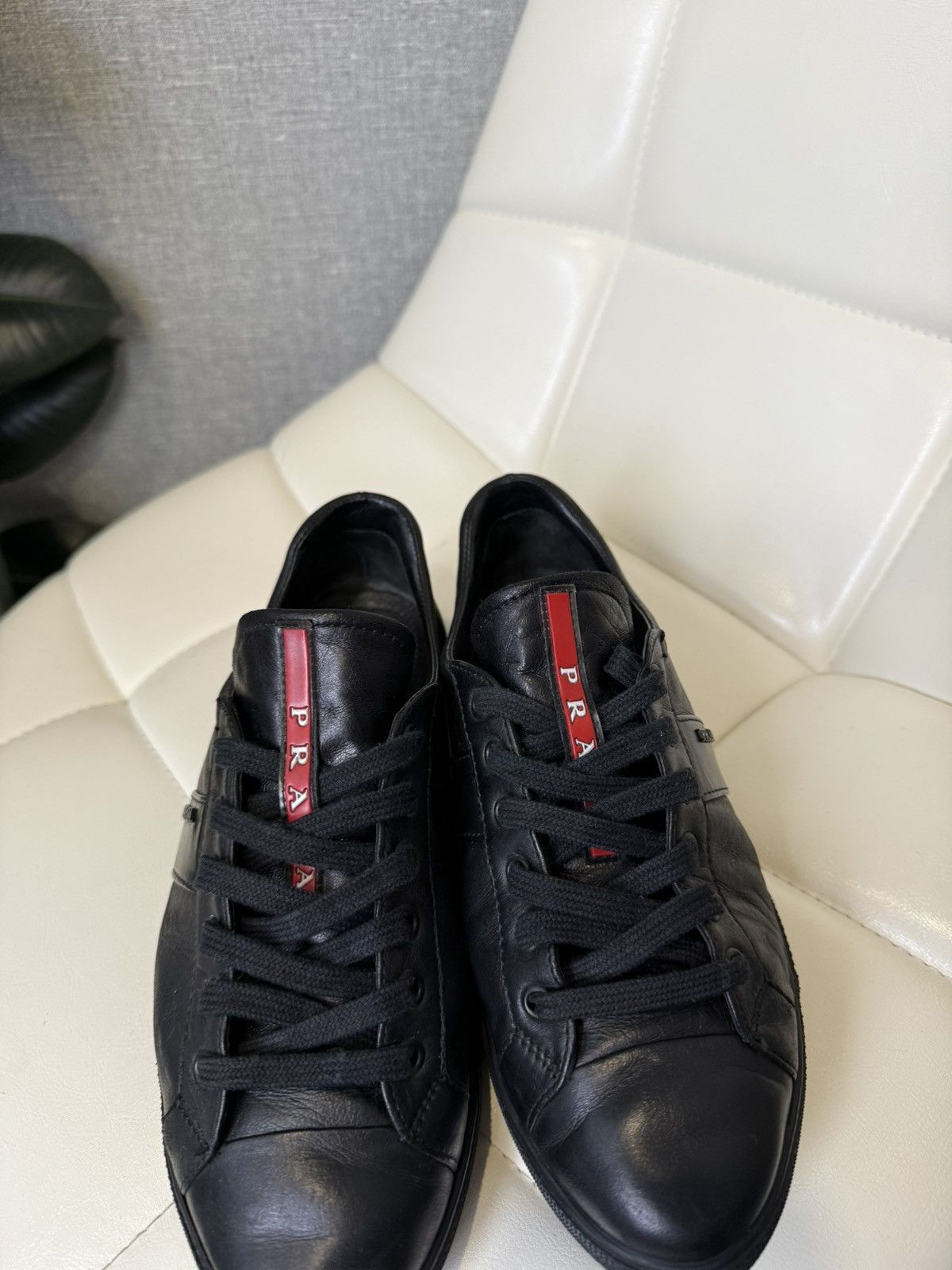 Prada Prada Black Leather Low-Top Sneakers with Red Stripe Logo Size US 7 / IT 37 - 17 Thumbnail
