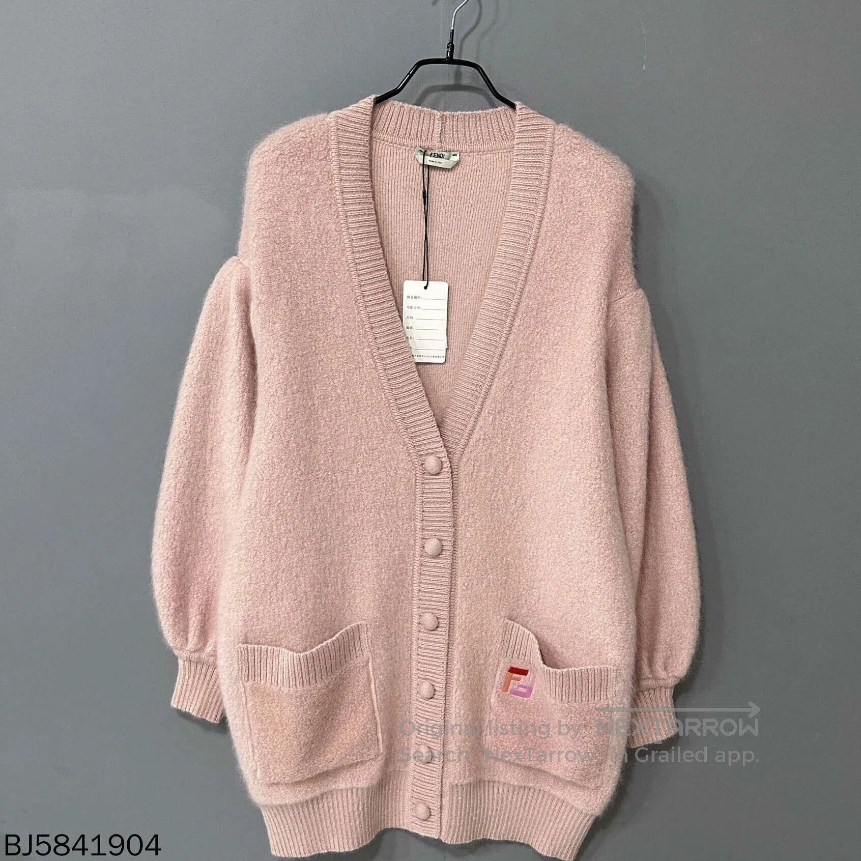 pink embroidered logo cardigan by Fendi.