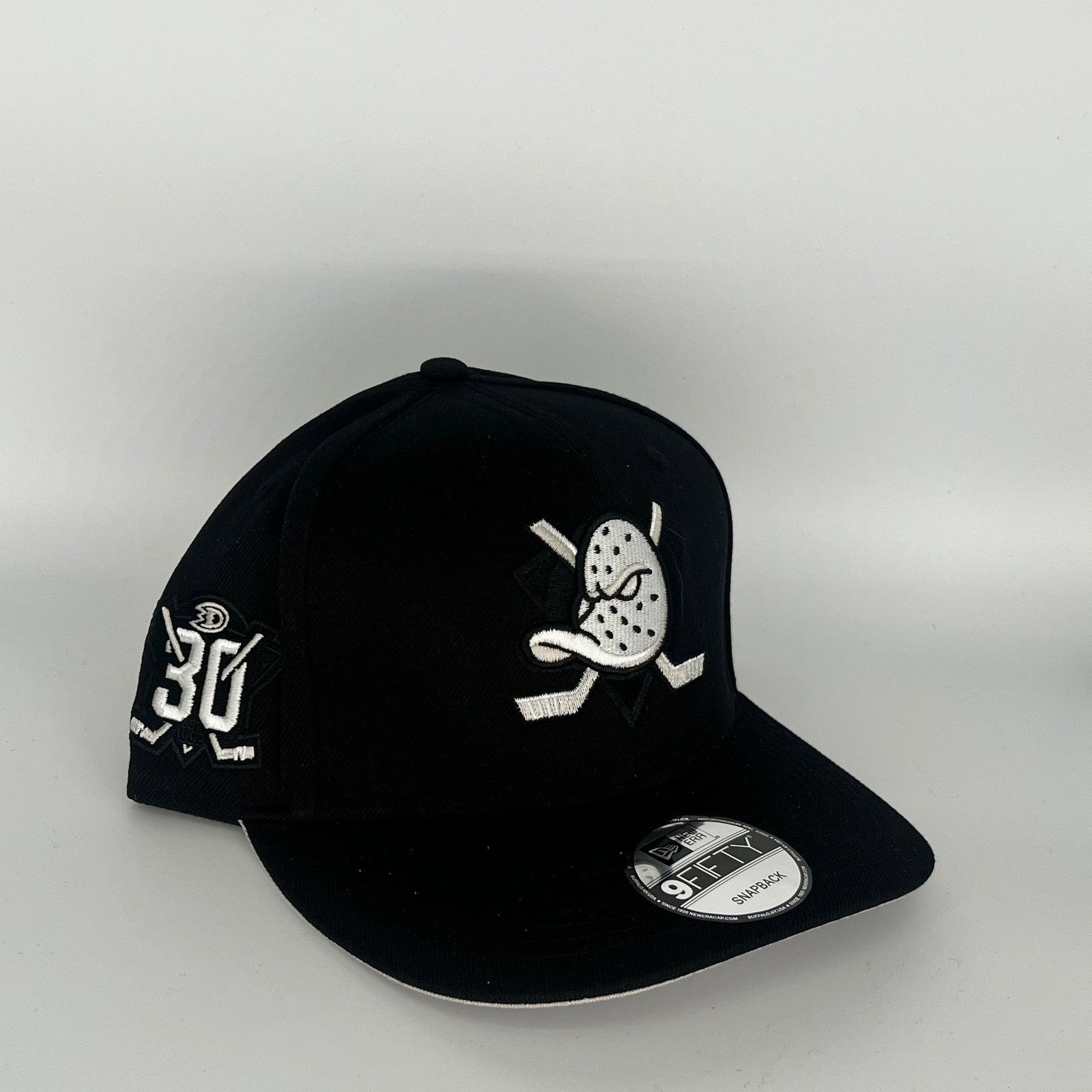 New Era Black Anaheim Ducks 30th Anniversary Side Patch New Era NHL Size ONE SIZE - 1 Thumbnail