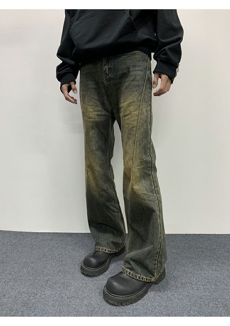 dirty washed distressed flared grunge jeans