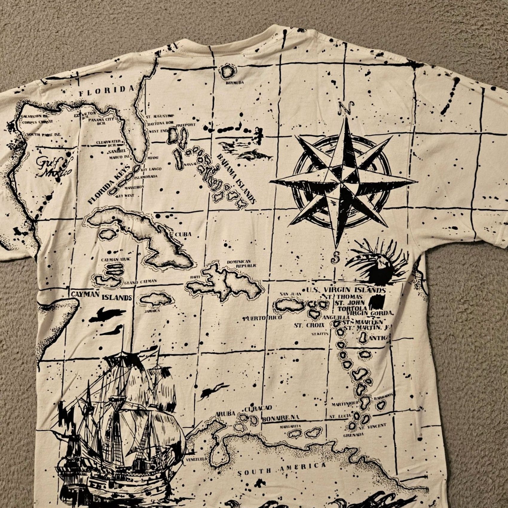 Delta VINTAGE Stanley Michaels AOP Map Caribbean Parrot Pirate Ship Graphic Shirt XL White Stain 29.5 22.5 Inches Mens Size US XL / EU 56 / 4 - 3 Thumbnail
