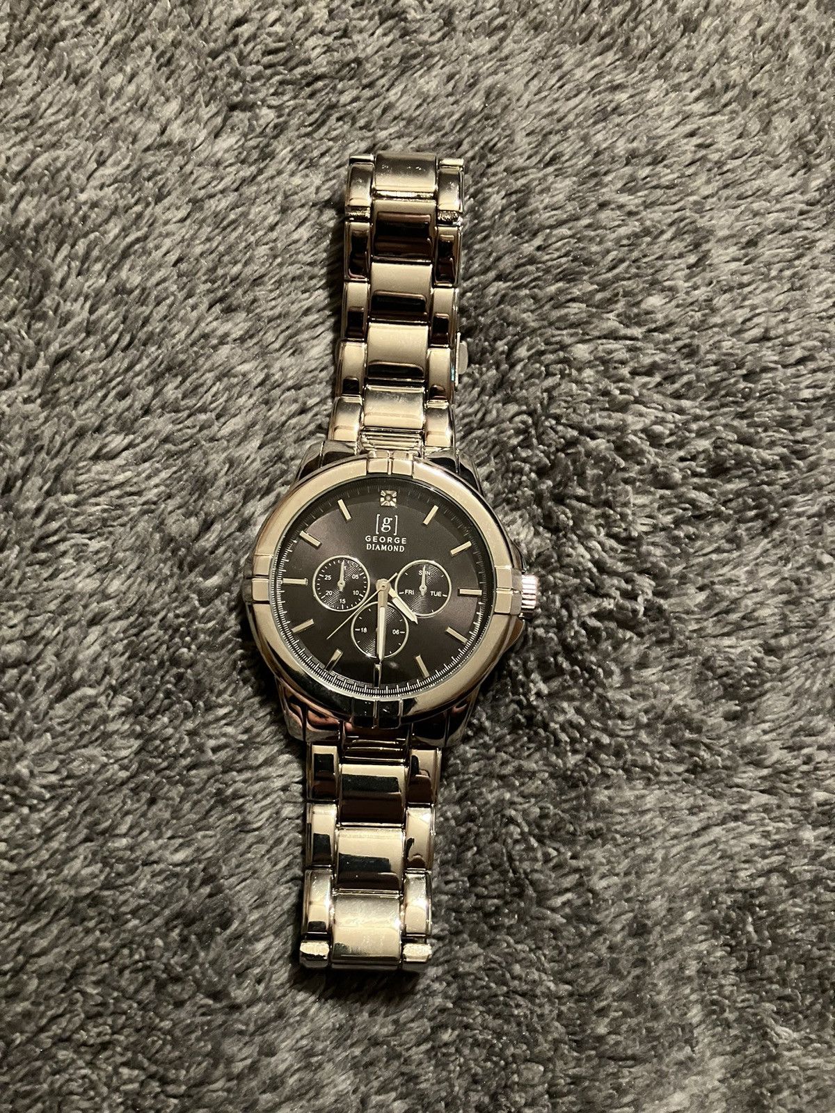 George George Diamond watch with metal band and black dial | Grailed