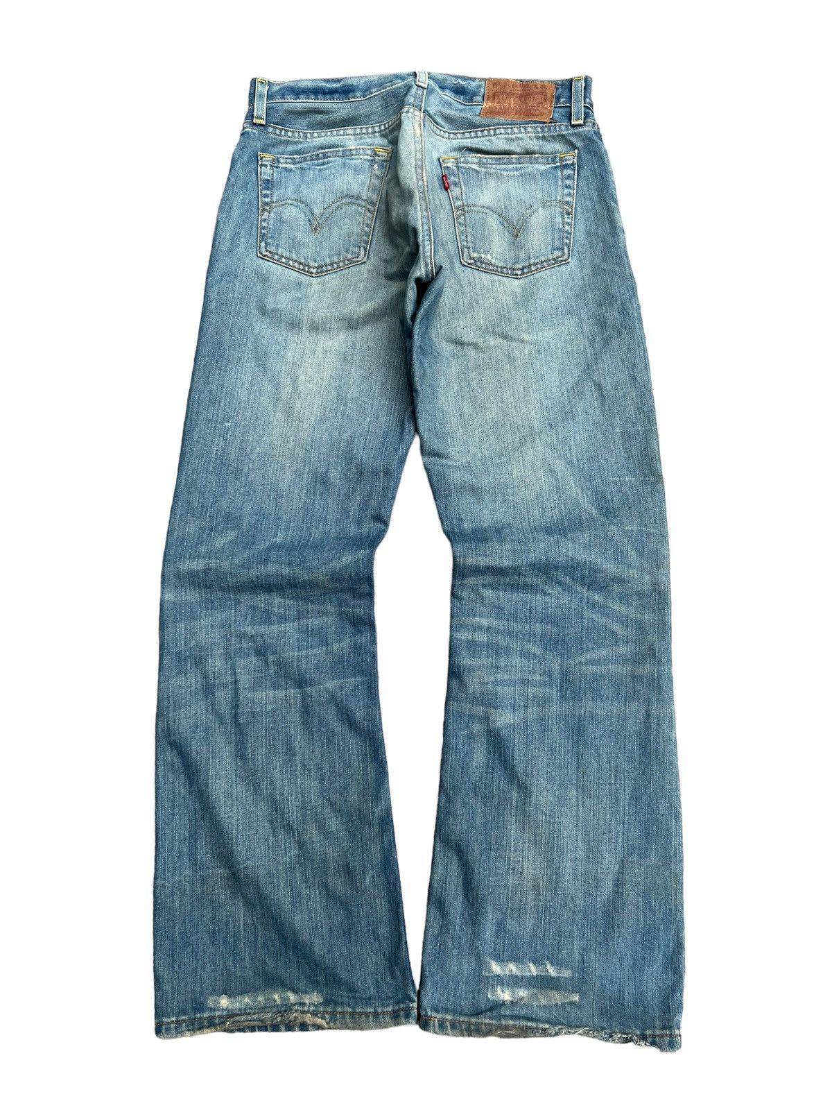 image of Levis Vintage Clothing x Vintage Levis 527 Bootcut Flared Mud-Wash Denim Jeans in Blue (Size 30)