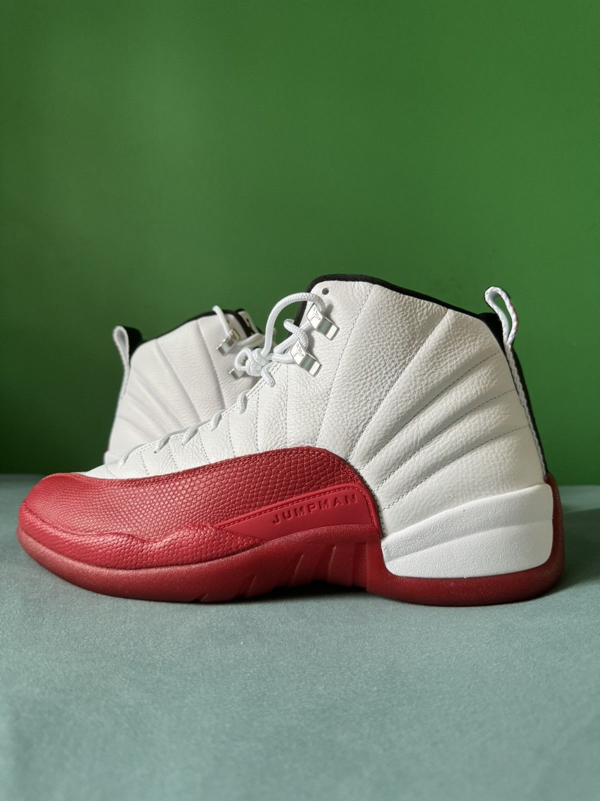 image of Nike Air Jordan 12 Cherry 2023 Shoes in Red, Men's (Size 13)