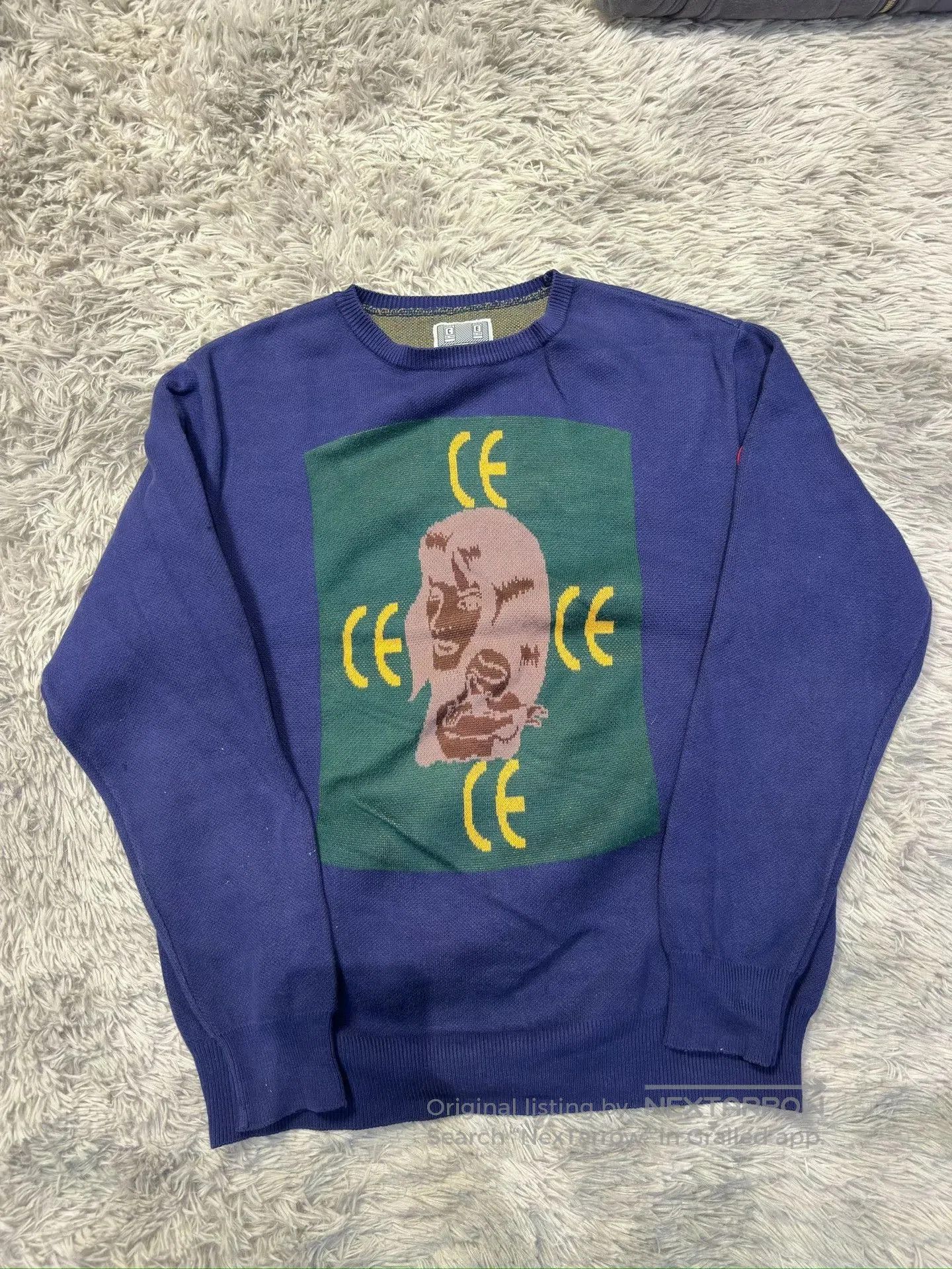 C.E/CAVEMPT Blue Knit Sweater.