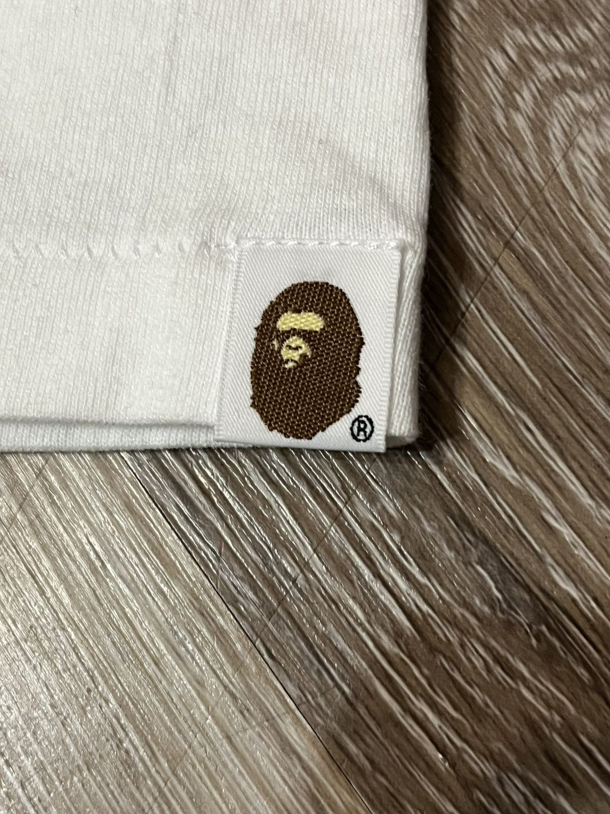 Bape BAPE 1993 WORLD GONE MAD HEAD LOGO TEE NEW WITH TAGS Size US L / EU 52-54 / 3 - 11 Thumbnail