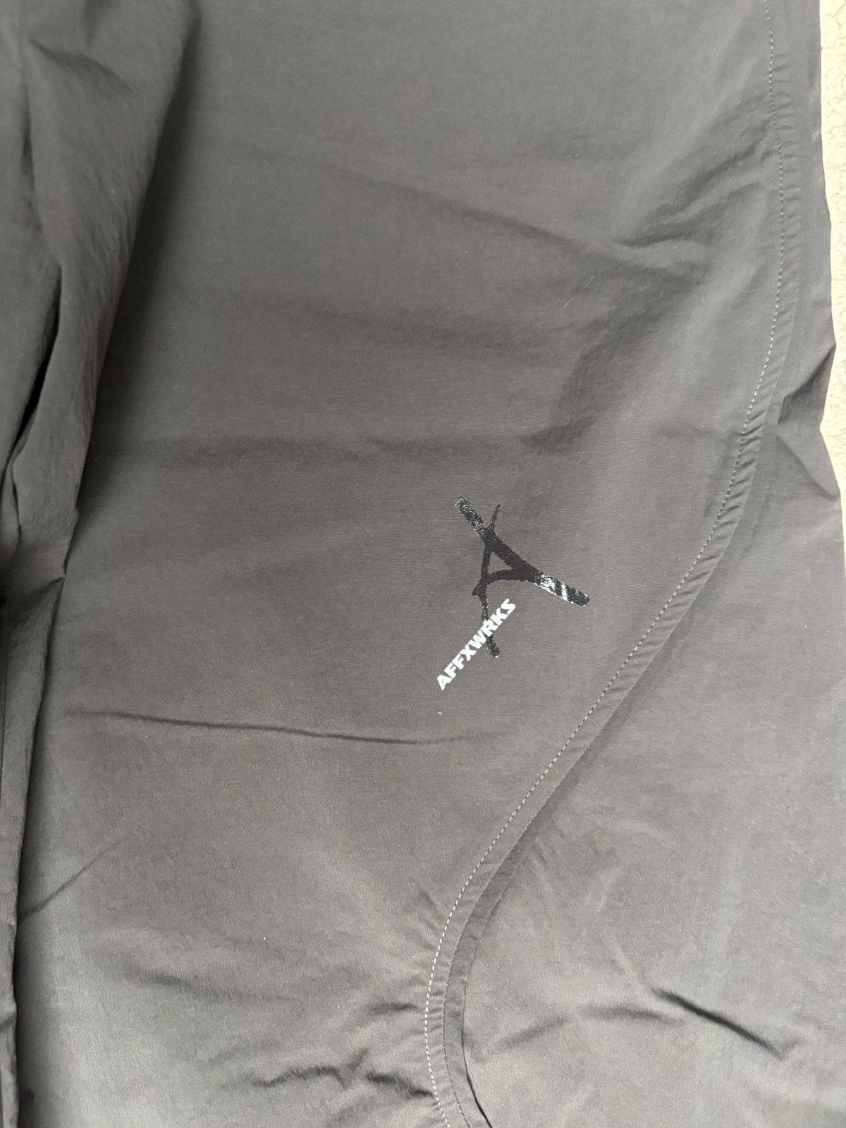 AFFXWRKS × Kiko Kostadinov AFFXWRKS Transit Water-Repellent Nylon Shell Track Pants Size US 30 / EU 46 - 7 Thumbnail