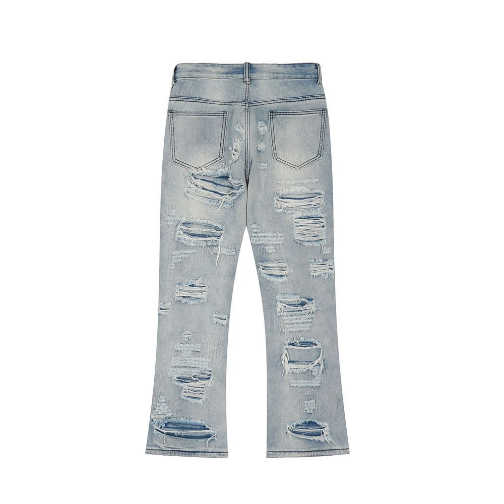 grunge damaged ripped washed flared jeans