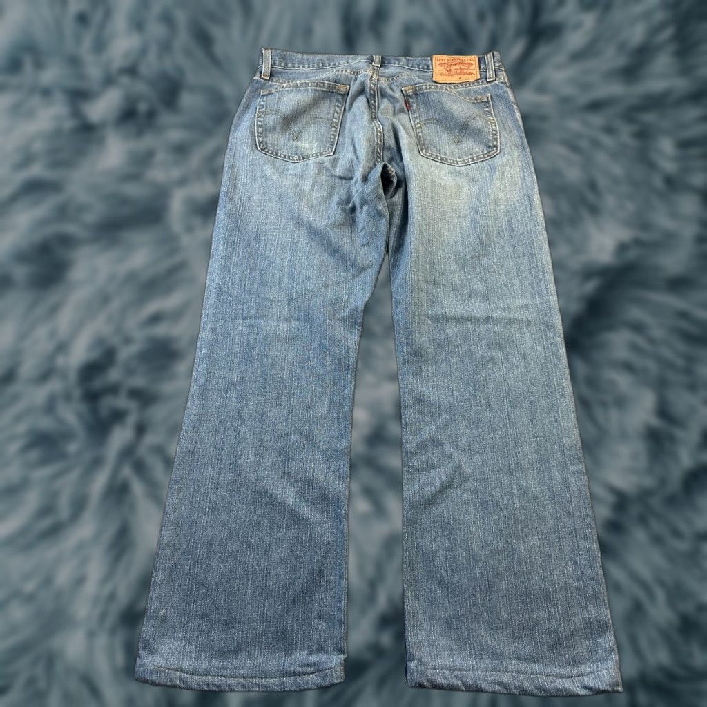 Levi's VINTAGE Levis Jeans Mens 34x31 527 Bootcut Cowboy Blue Denim Faded Low - Levi's 527 Series Jeans Mens 90s Cowboy Bootcut Denim Blue 527 Size US 34 / EU 50 - 1 Thumbnail