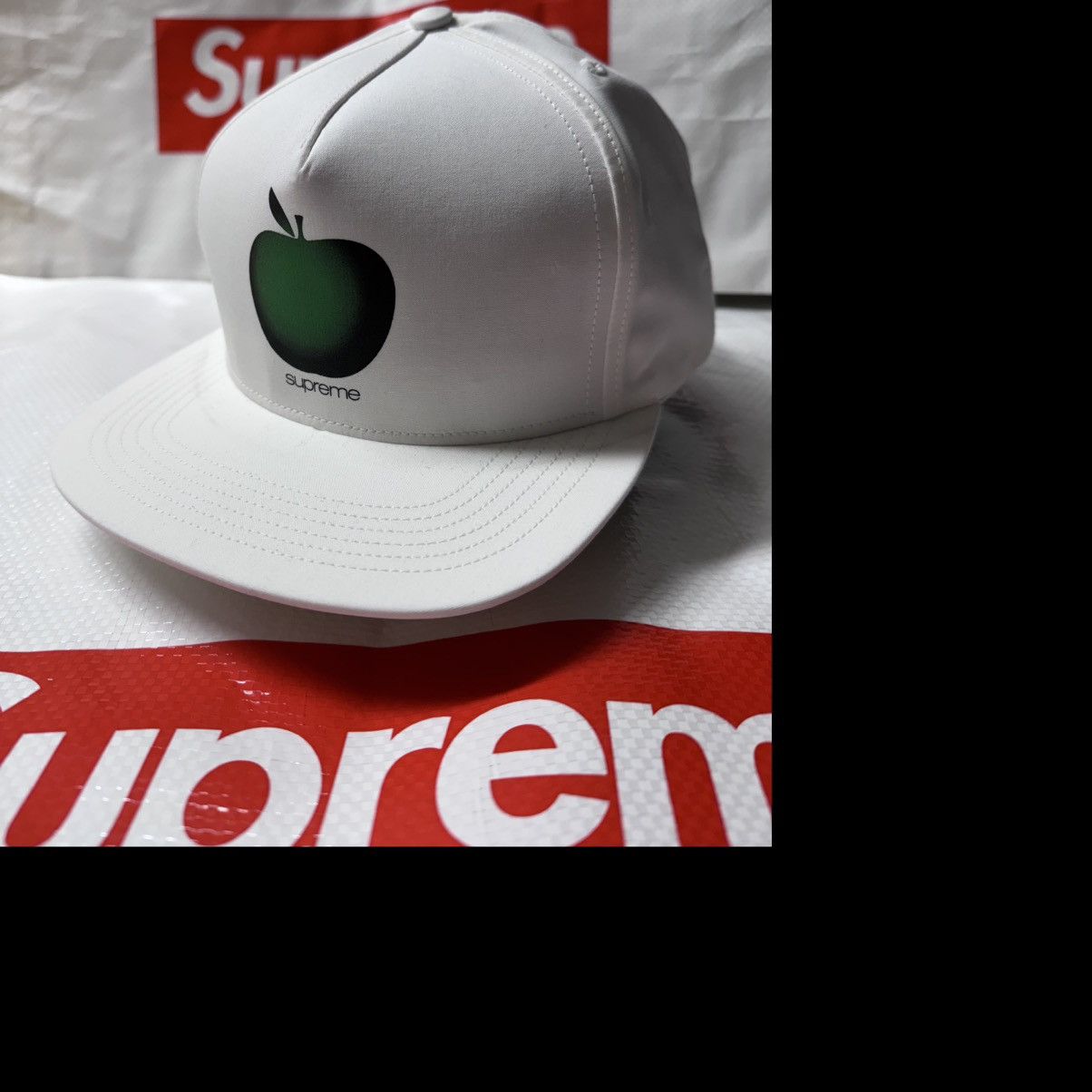 Supreme apple hat clearance