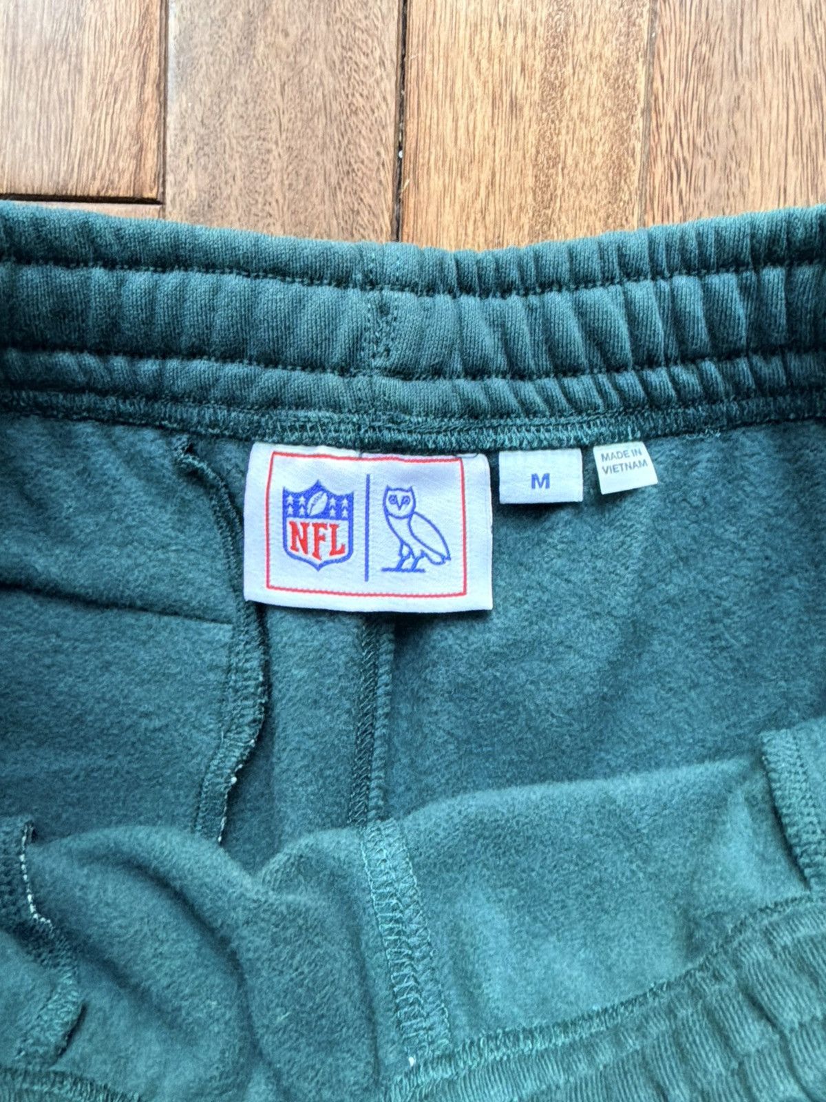 NFL × October's Very Own Octobers Very Own OVO NFL Eagles Sweatpants - midnight green Size US M / EU 48-50 / 2 - 4 Thumbnail