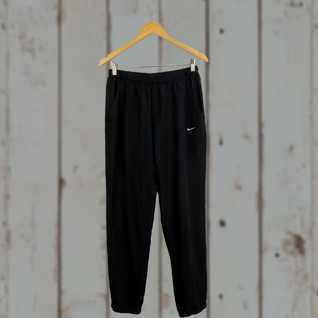 Nike VINTAGE Nike Nylon Track Pants M Black Mens | 90s Y2K Rare Retro Hype, Activewear, Pants, Regular, Size M, Black, Nylon, 90s, Mens Size US 31 - 1 Thumbnail