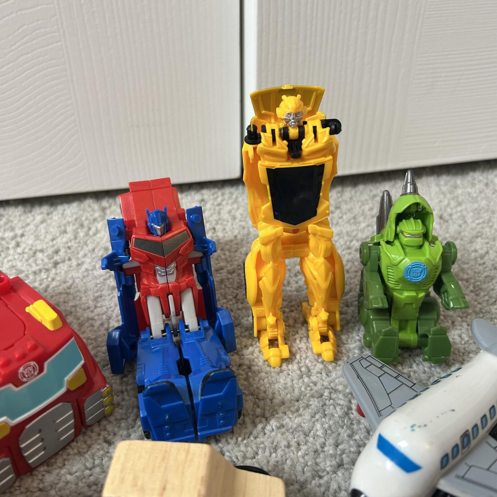 Transformers 10 Toy Lot,6 TRANSFORMERS,4 misc toys; cars,plane,helicopter Size ONE SIZE - 4 Thumbnail