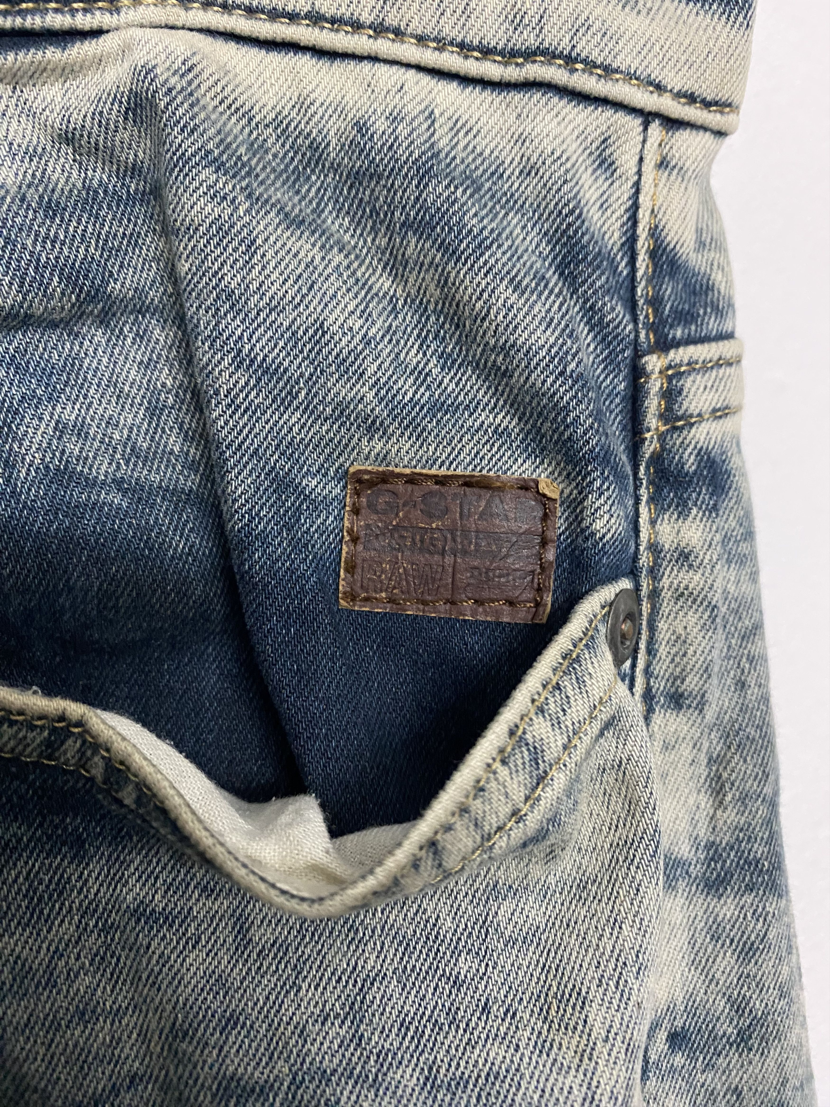 G-Star RAW Revend Super Slim Jeans Acid Wash Distressed jean