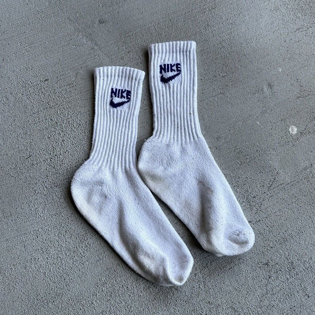 White nike fashion socks with blue swoosh